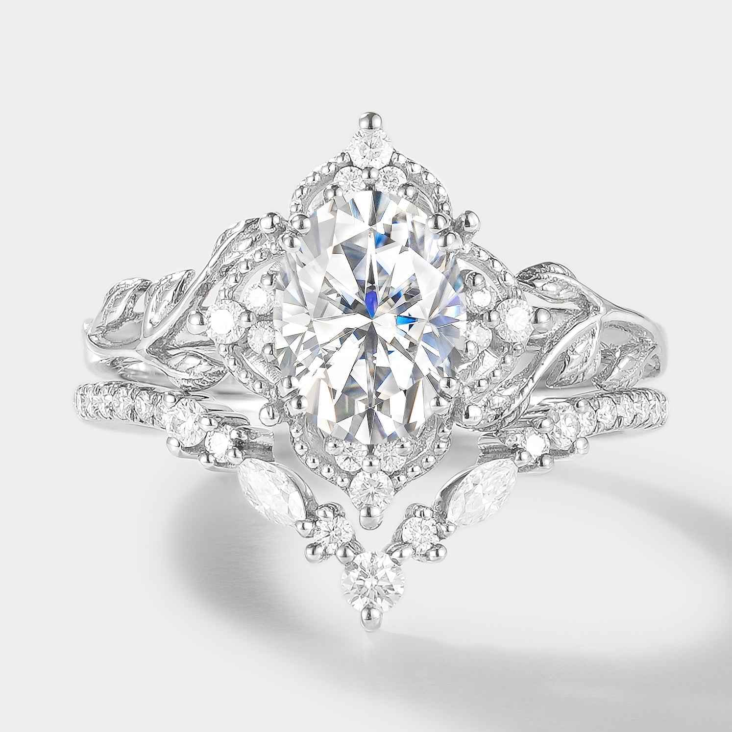 Oval moissanite bridal set with leaf accents