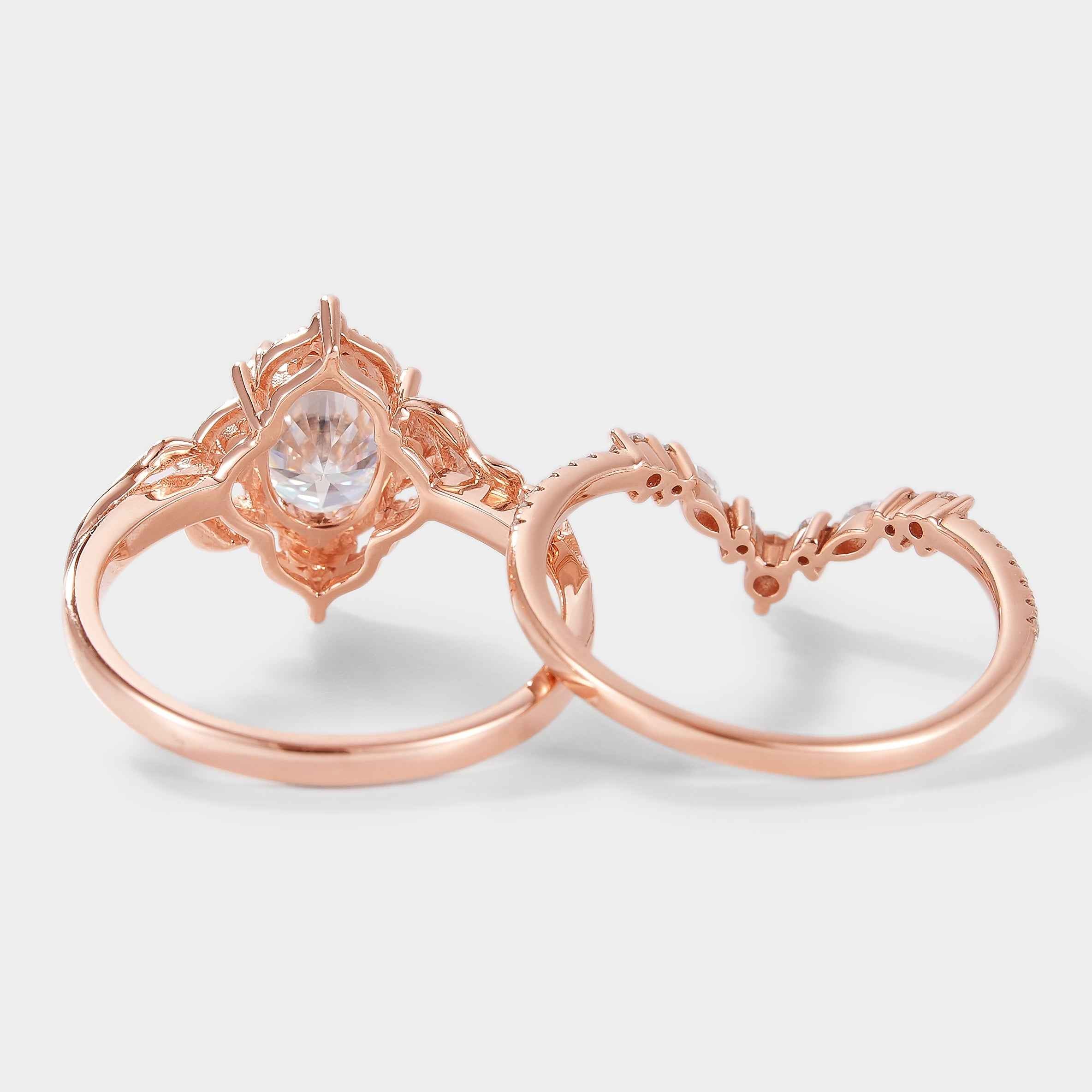 Rose gold bridal set with oval cut moissanite and leaf accents
