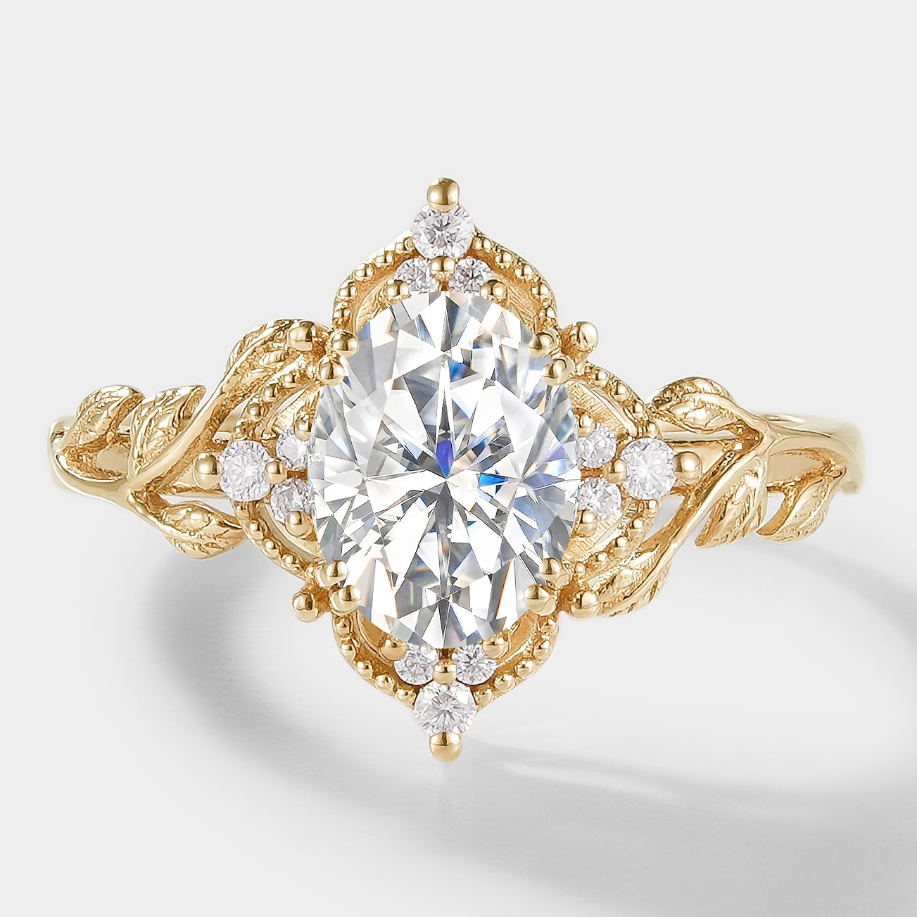 Oval Moissanite Leaf Engagement Ring in Yellow Gold – Sylva