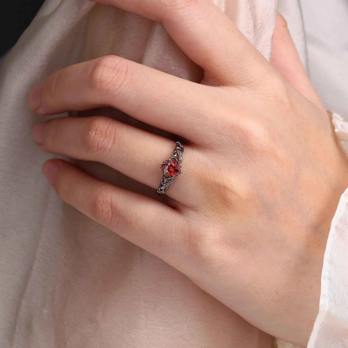 Gothic Skull Hand Garnet Heart Engagement Ring