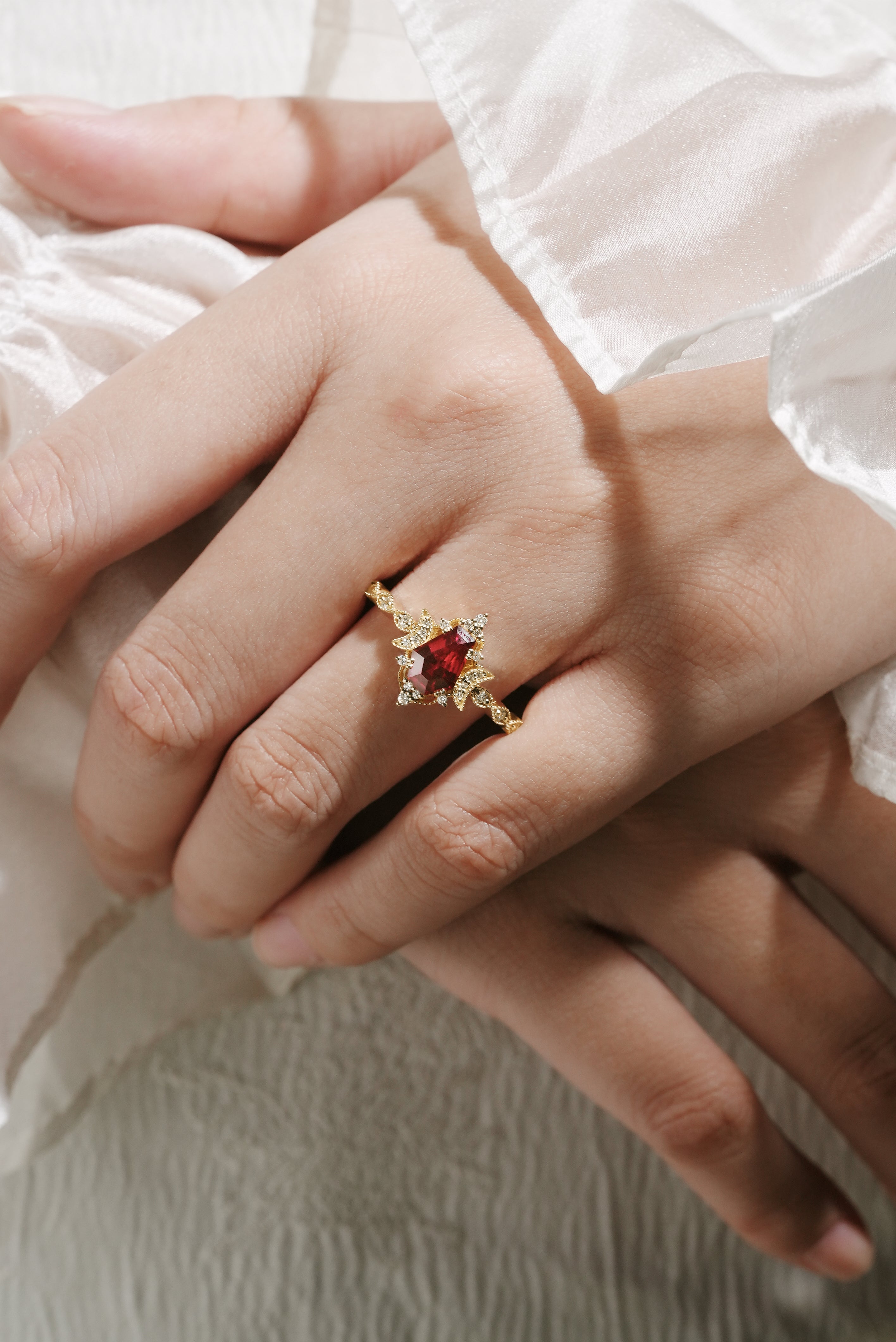 Yellow gold engagement ring with a coffin-cut lab grown ruby and moissanite accents, bridal set.