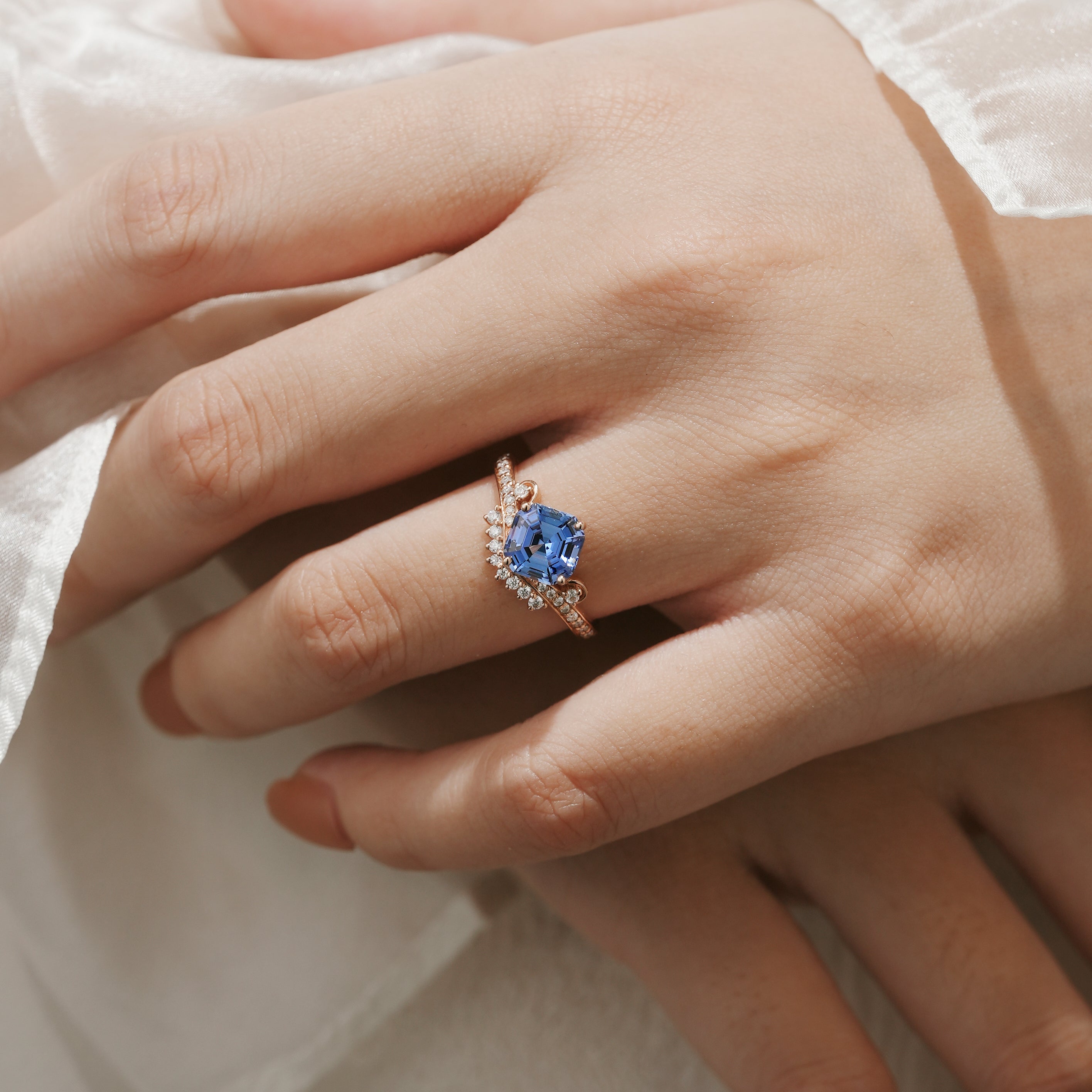 Rose gold engagement ring with cushion-cut cornflower sapphire