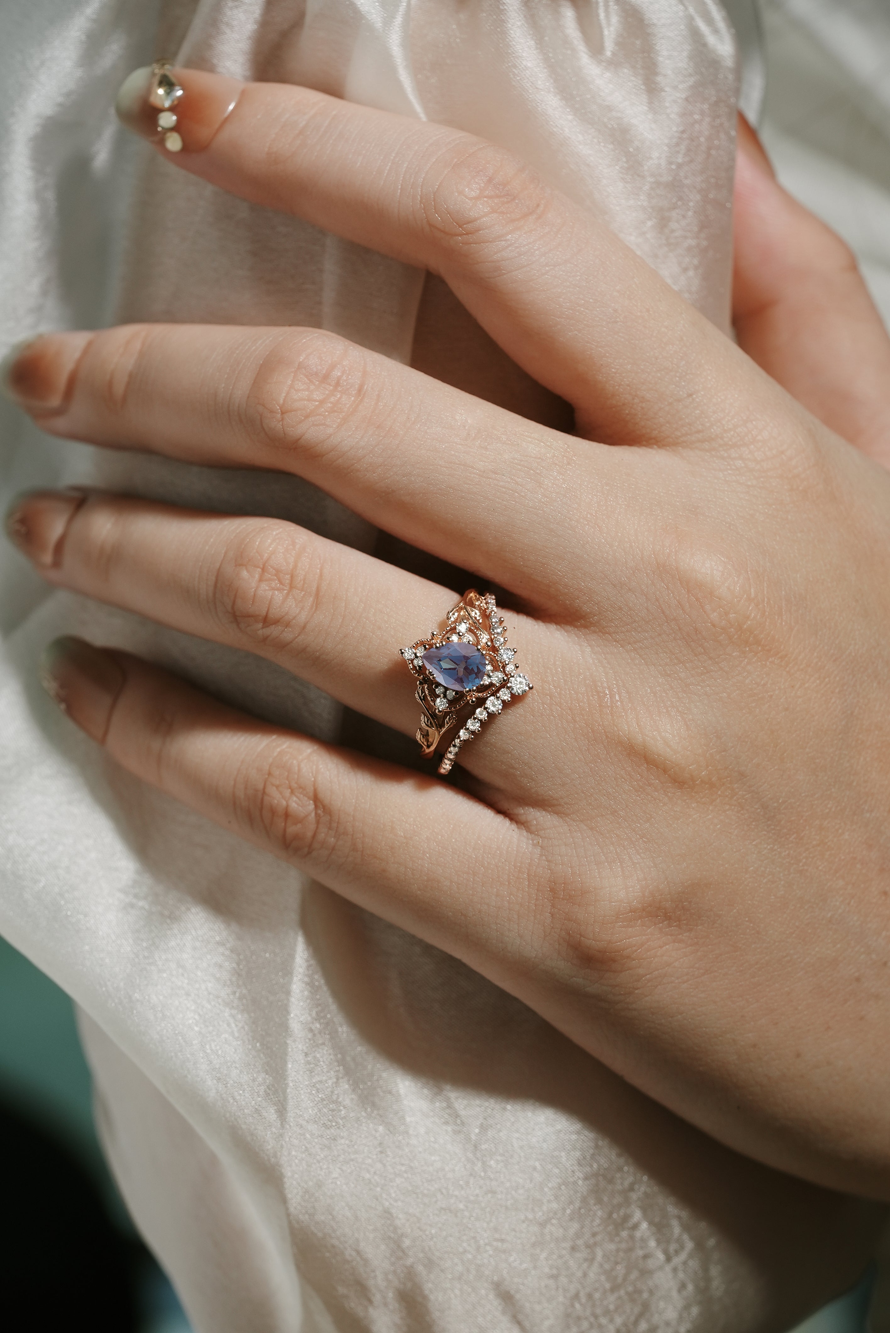 Rose gold pear-cut alexandrite bridal set with moissanite accents, vintage engagement ring set