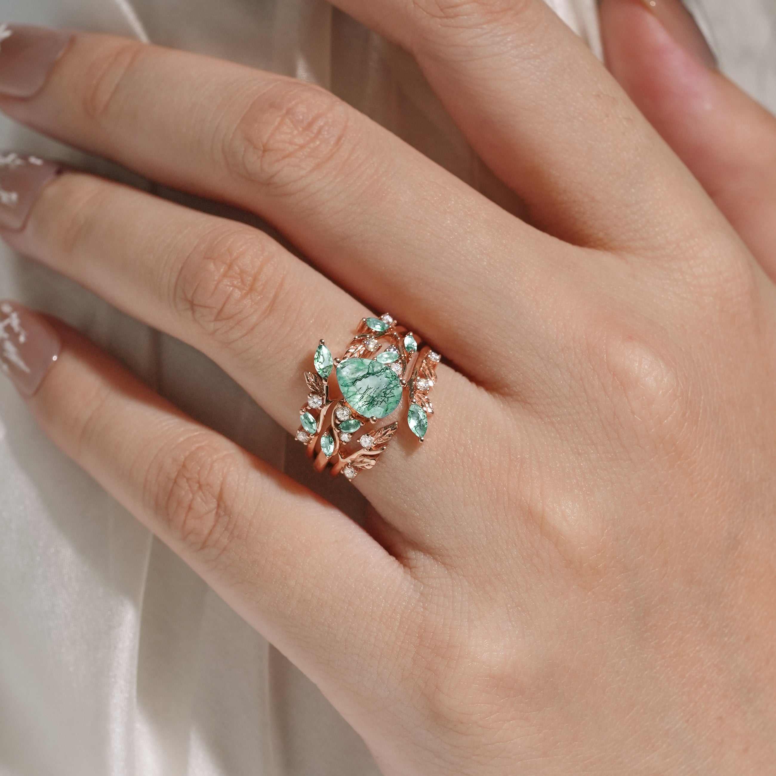 Rose gold moss agate engagement ring set with leaf and moissanite accents, vintage style.