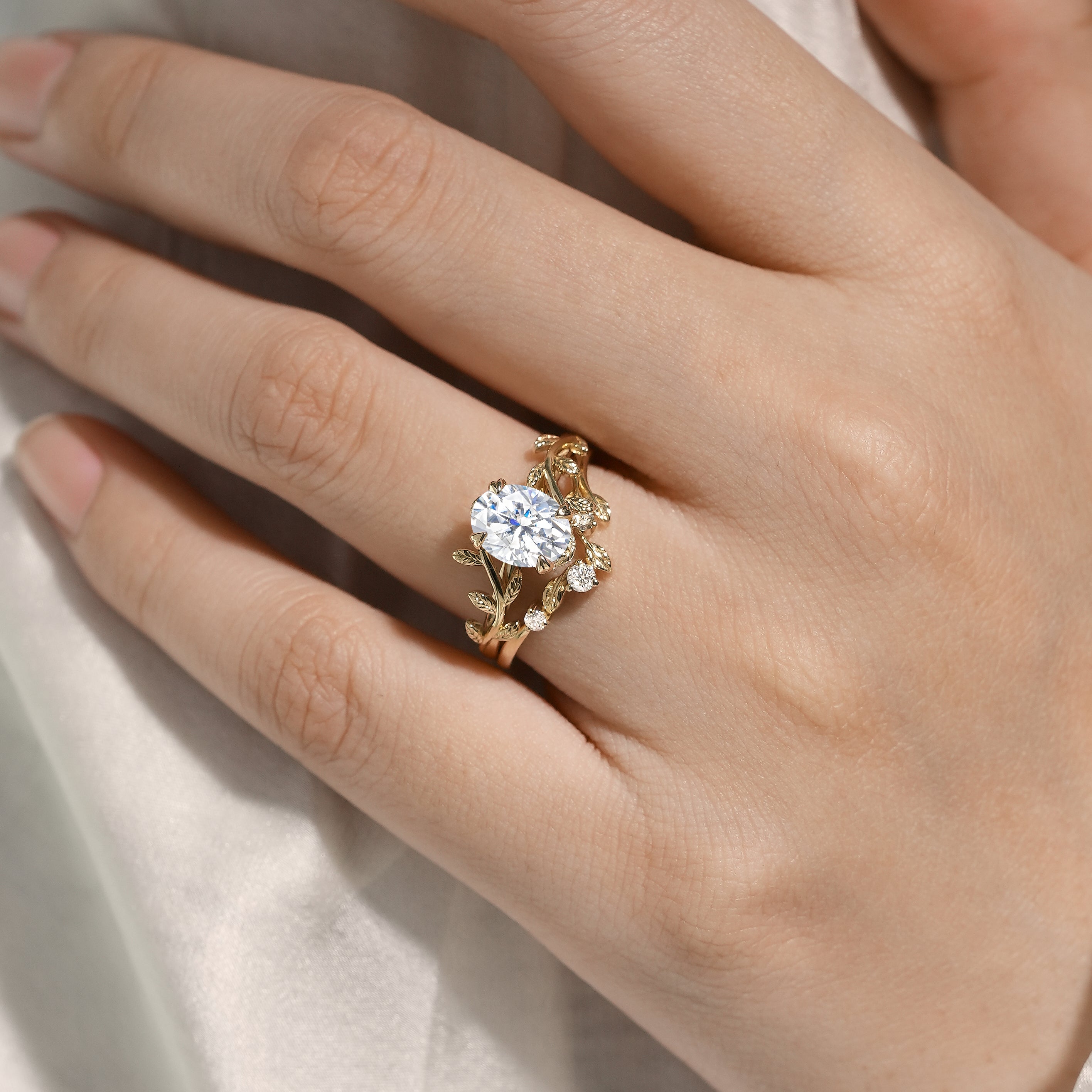 Oval cut moissanite ring with leaf design, Lahela Jewelry