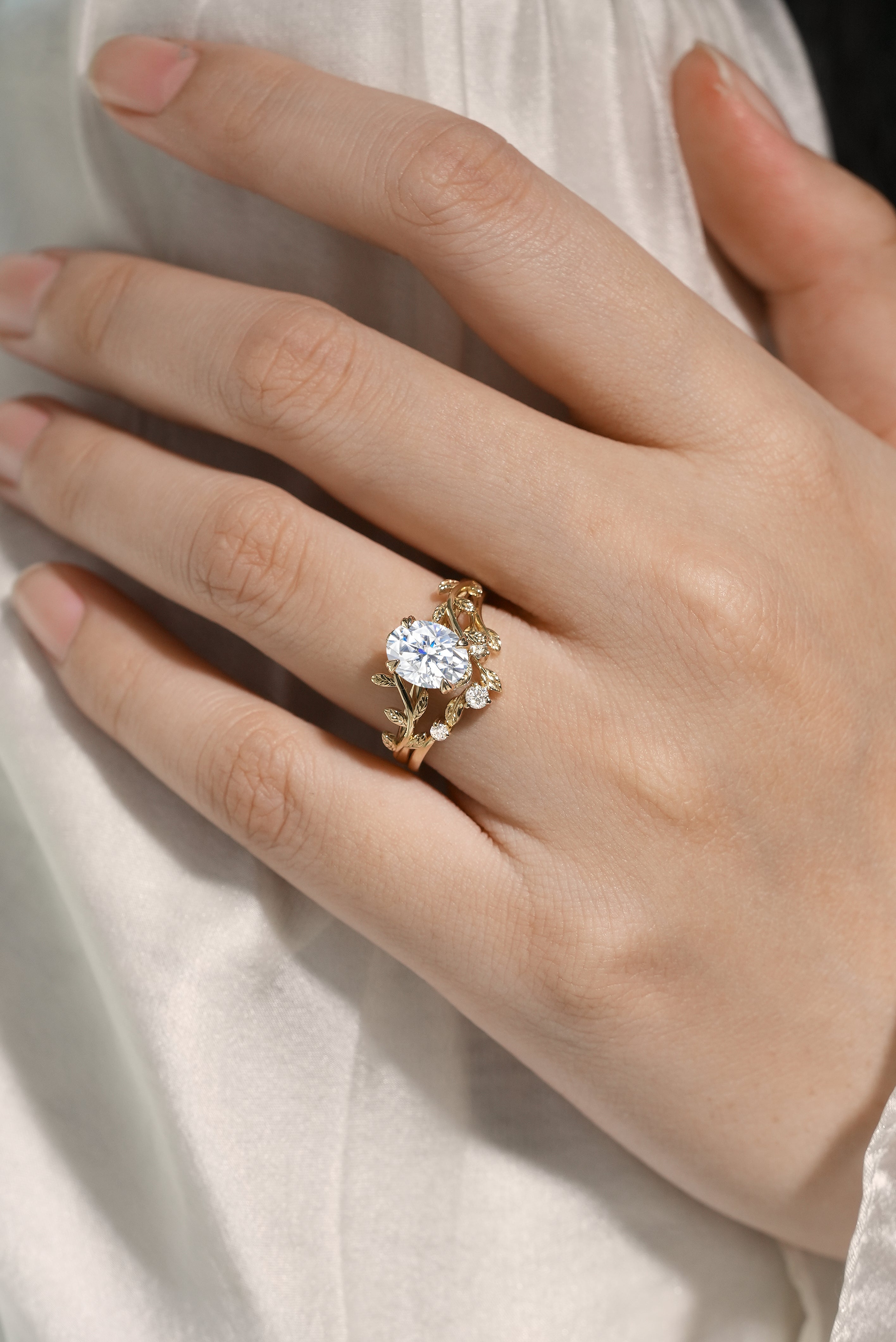 Oval cut moissanite ring with leaf design, Lahela Jewelry