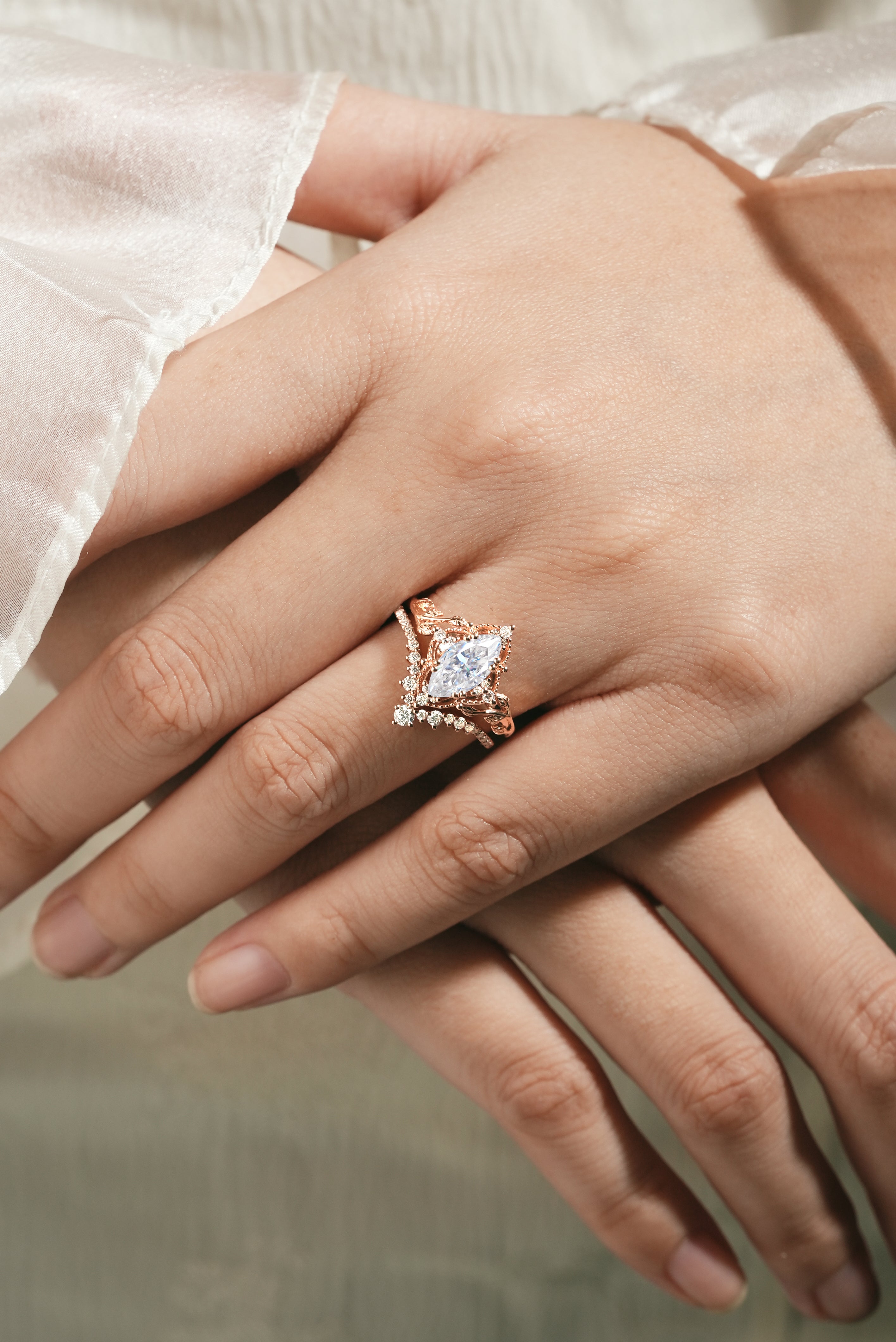 Marquise moissanite engagement ring and curved band, rose gold