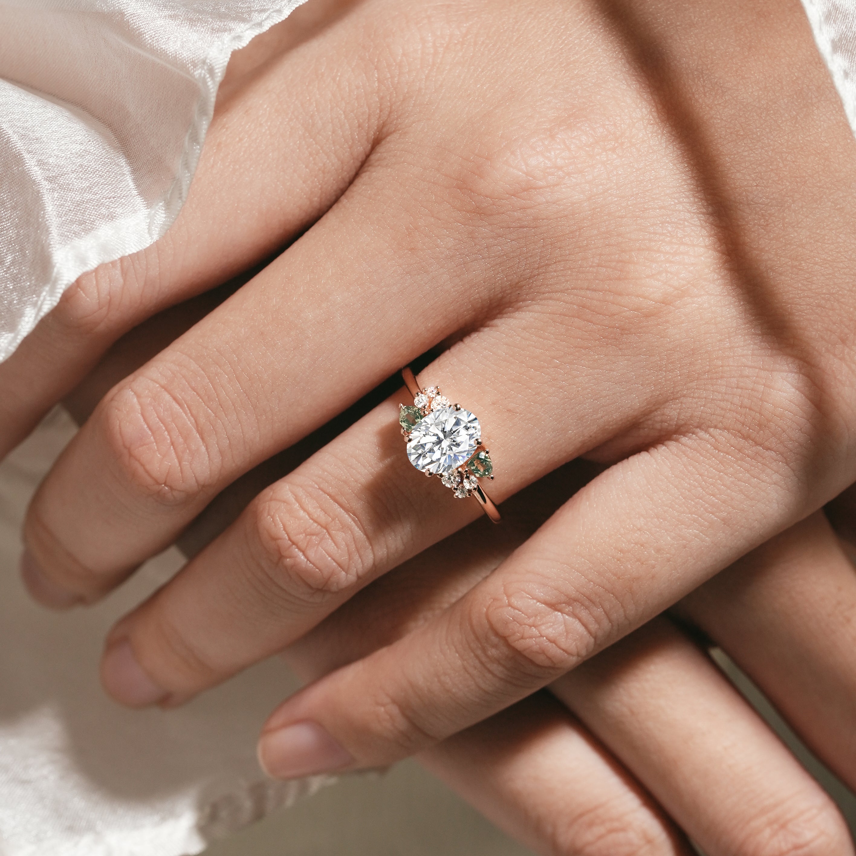 Oval Moissanite Ring with Triangle Spinel Cluster on Hand