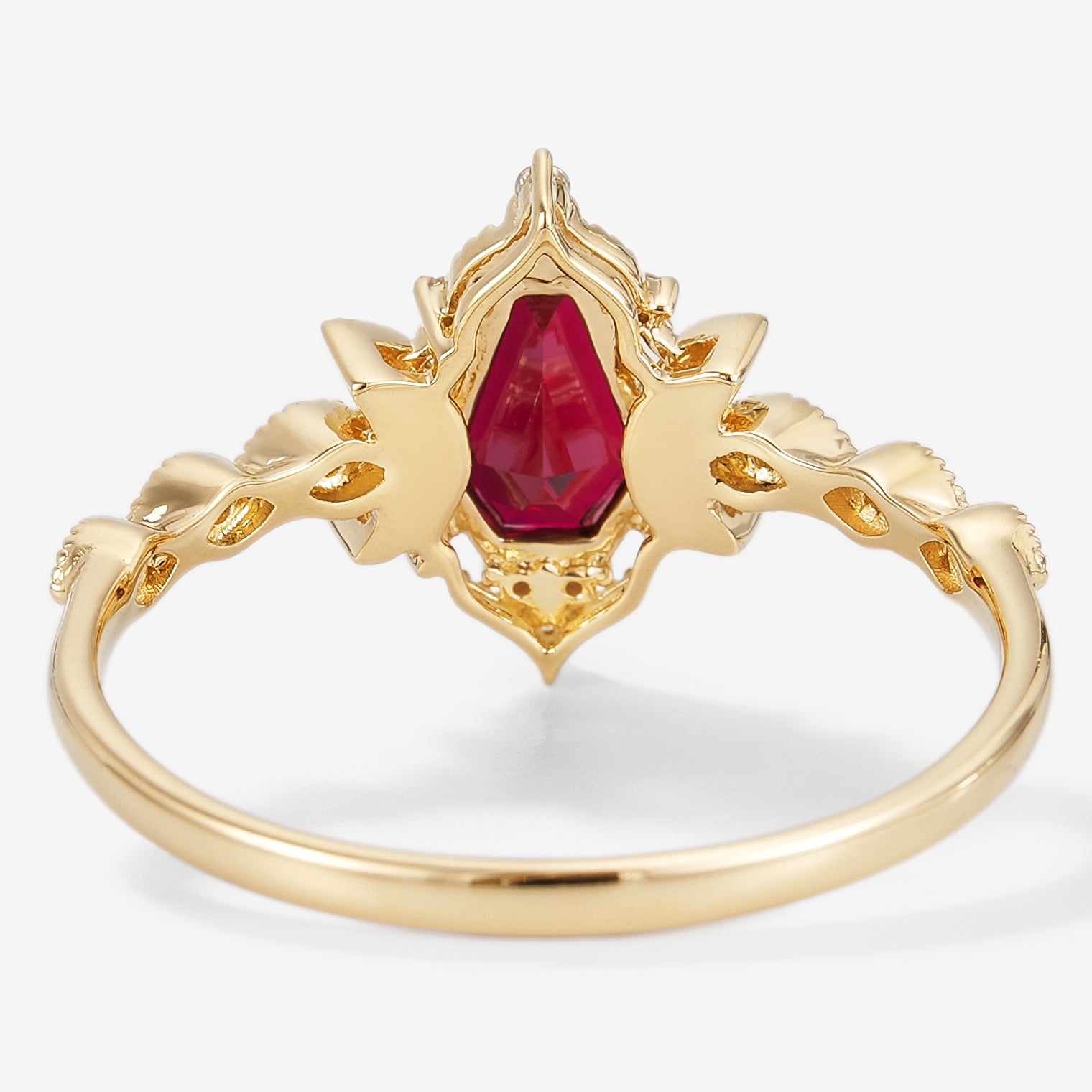 Yellow gold moon-inspired coffin cut ruby engagement ring with moissanite accents, bridal set