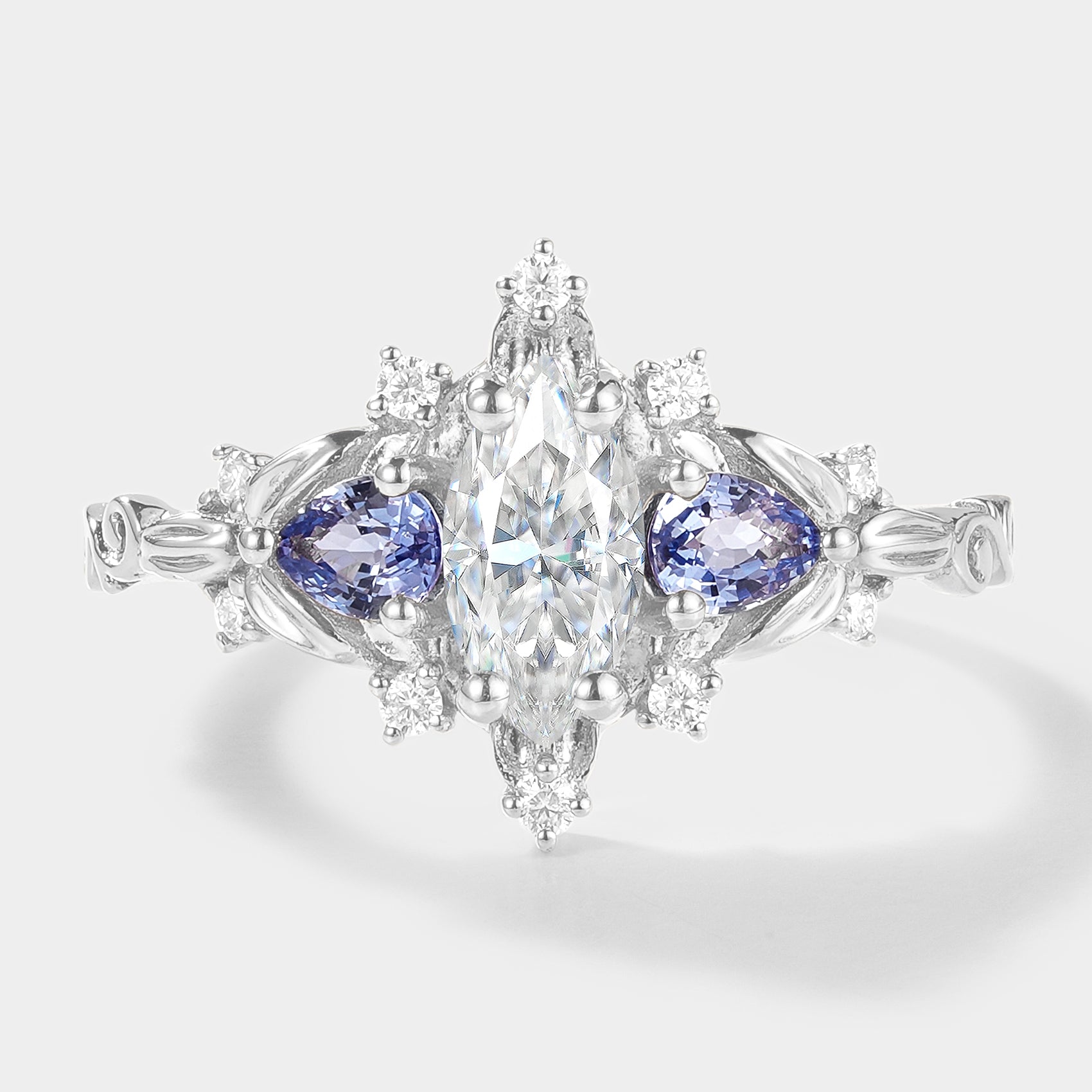 Marquise Cut Moissanite Ring with Sapphire Cluster