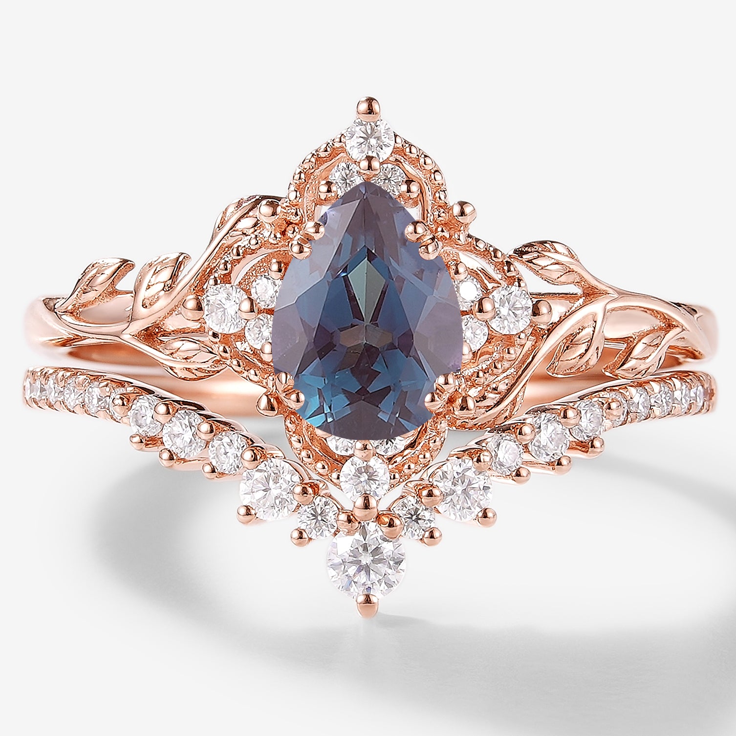 Pear cut Alexandrite leaf bridal set with moissanite and rose gold, vintage style engagement ring set.