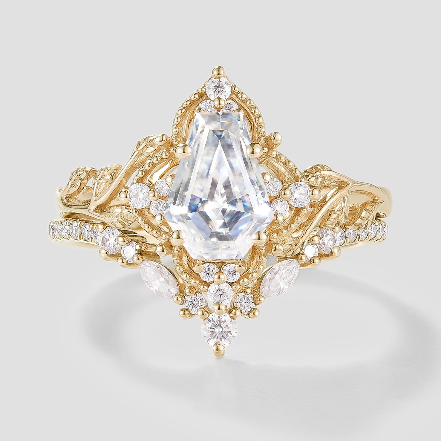 Gold leaf engagement ring with coffin cut moissanite bridal set