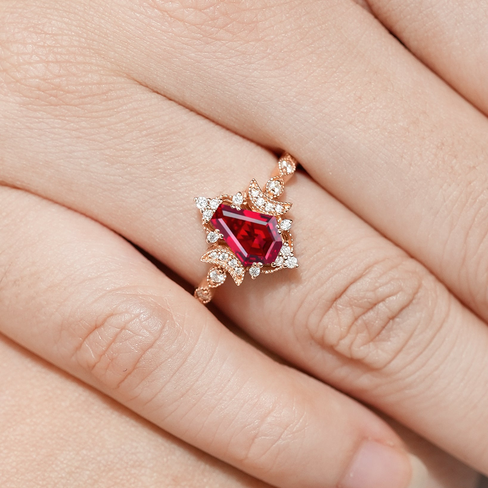 Rose gold coffin cut ruby ring with moon design. Anniversary ring