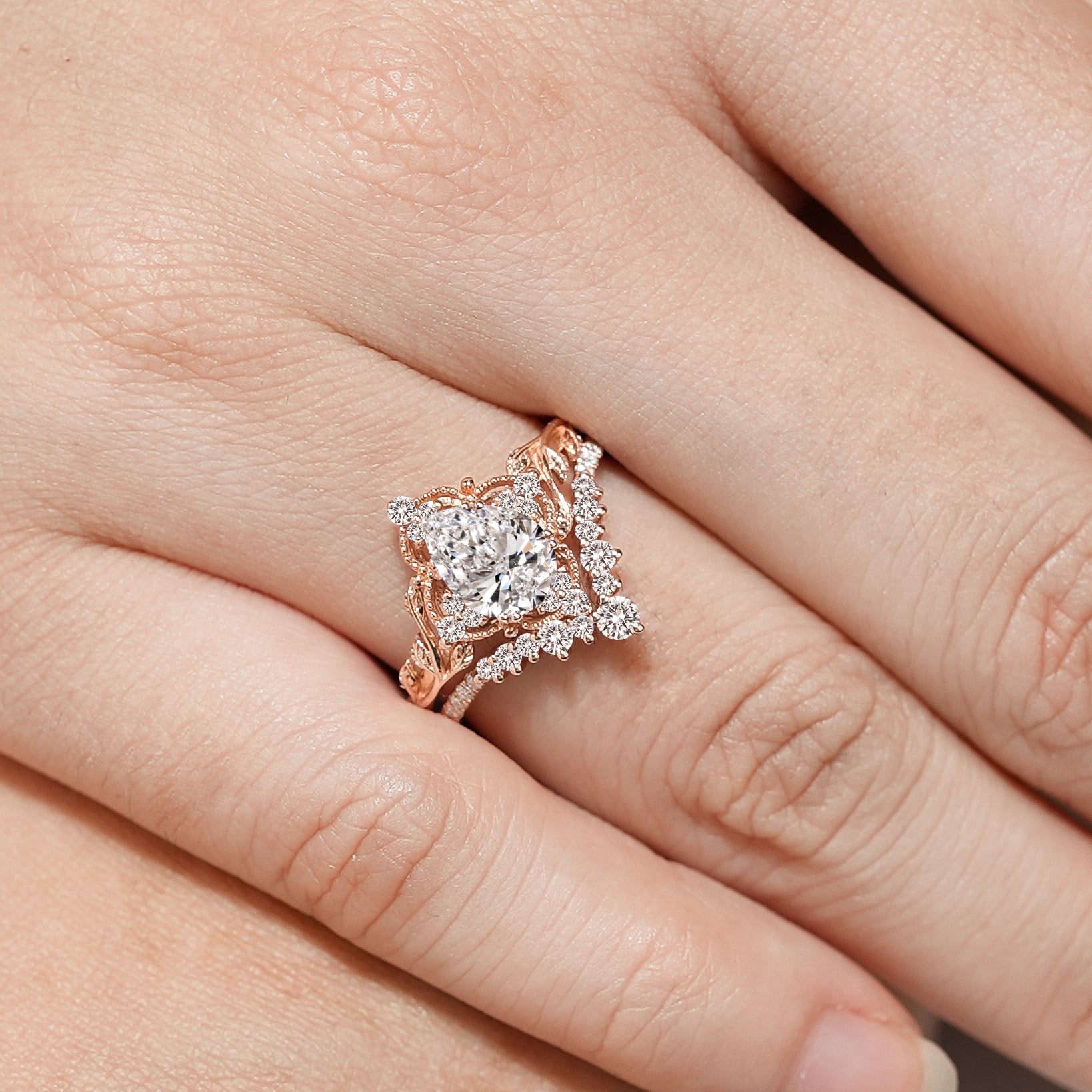 Square cut diamond nature inspired engagement ring with leaf detail