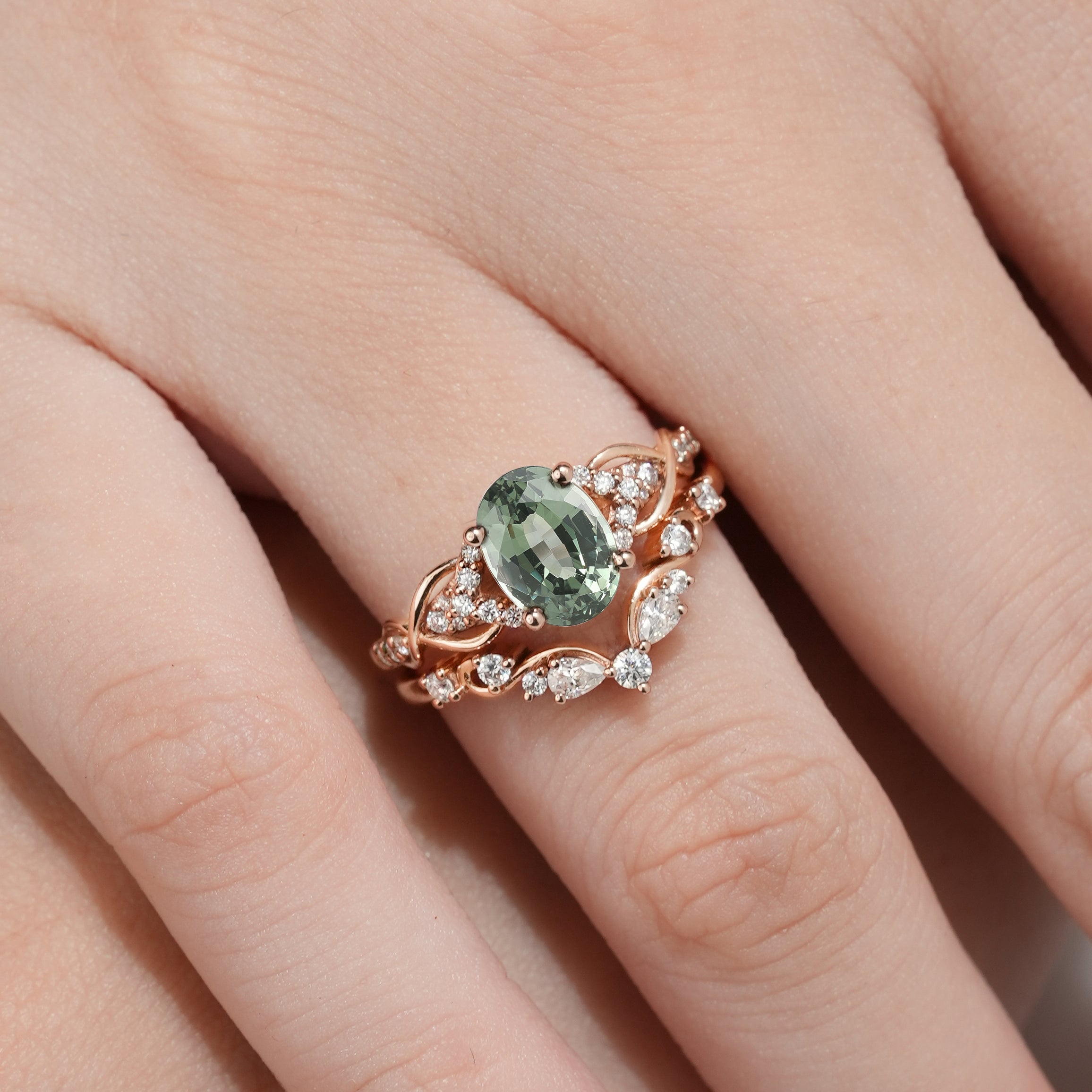 Nature-inspired green sapphire engagement ring set
