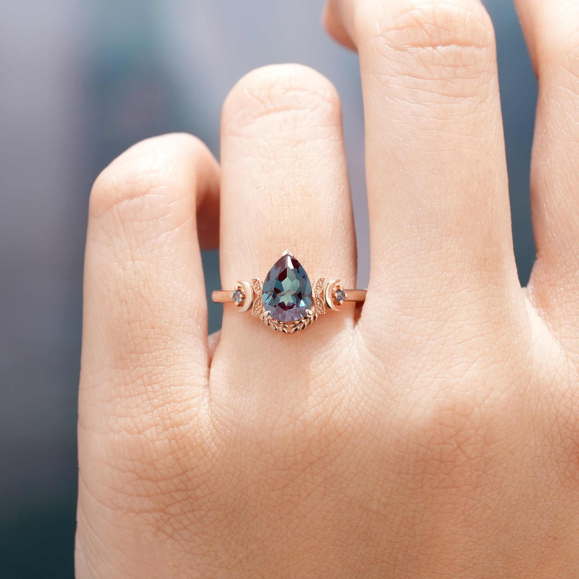 Rose gold pear-cut alexandrite engagement ring