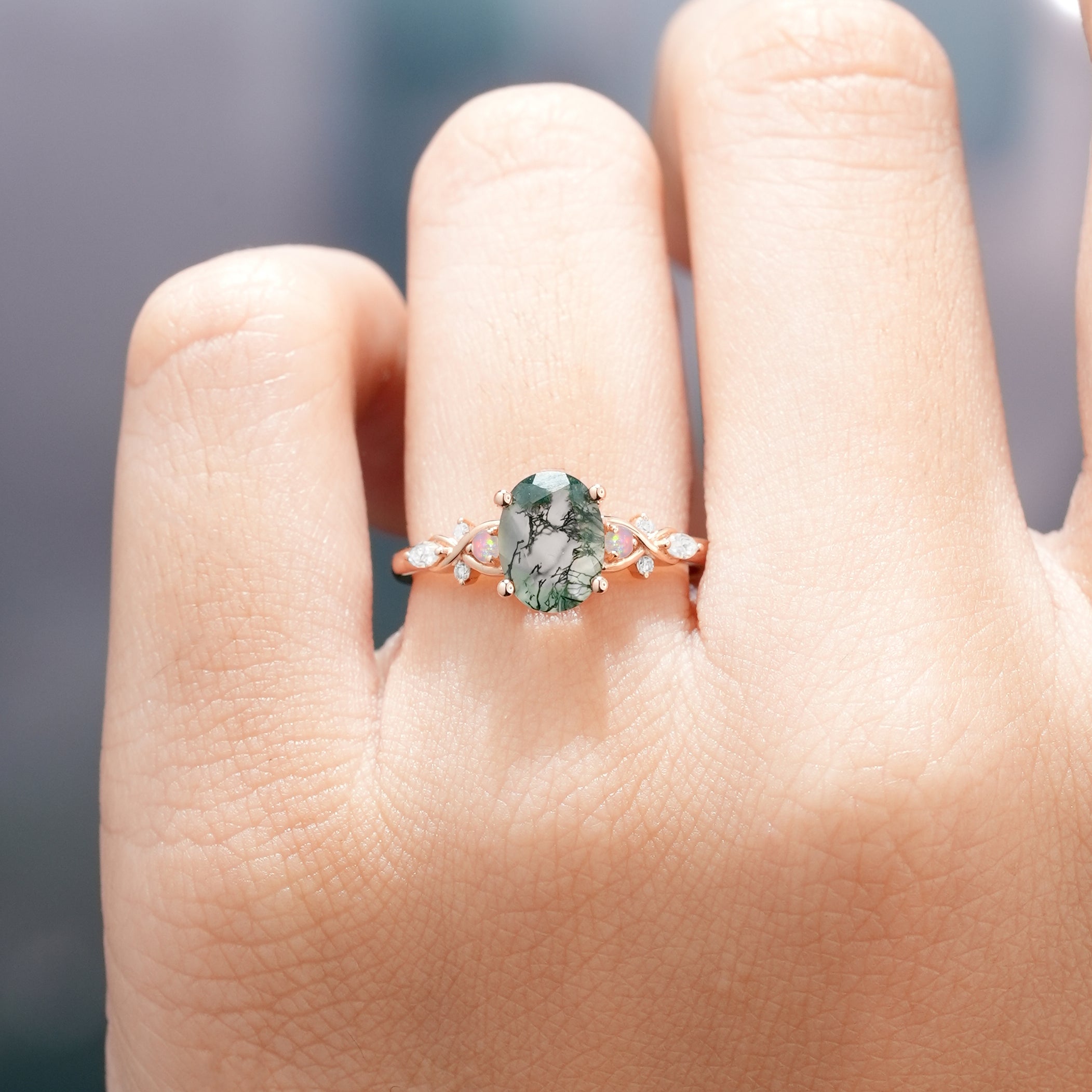 Nature-inspired moss agate engagement ring, rose gold band, opal accents