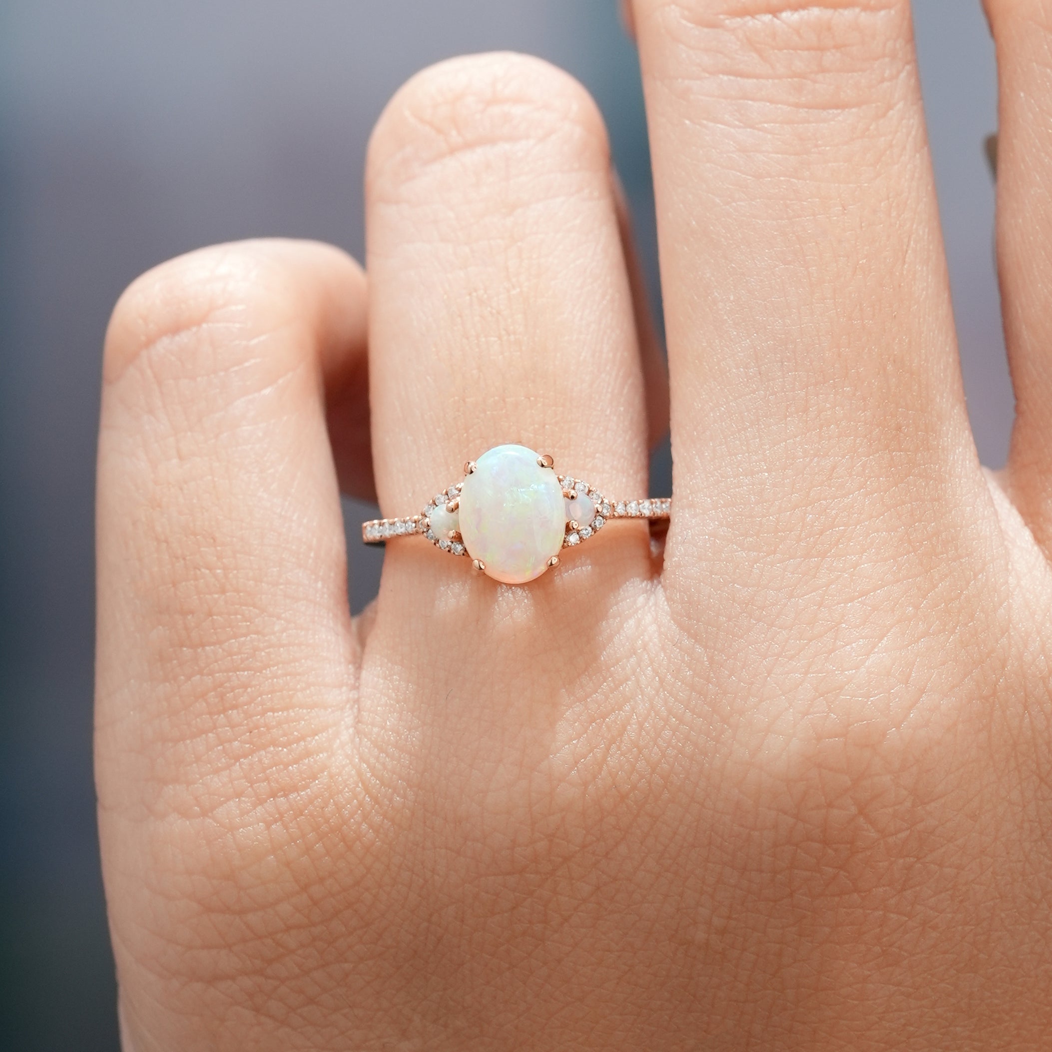 Oval Opal Engagement Ring on Hand in Rose Gold