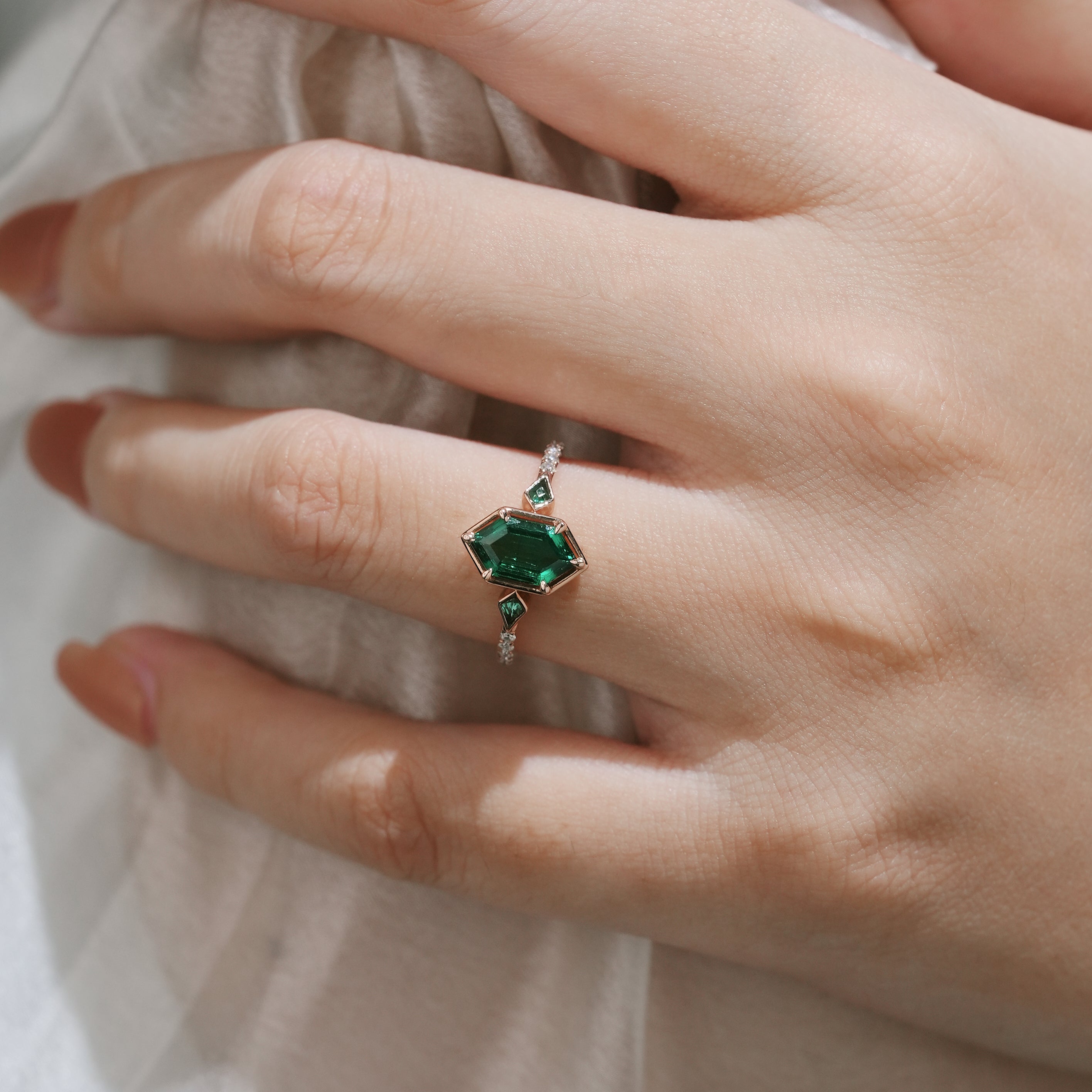 Emerald engagement ring with hexagon cut center stone, Lahela Jewelry