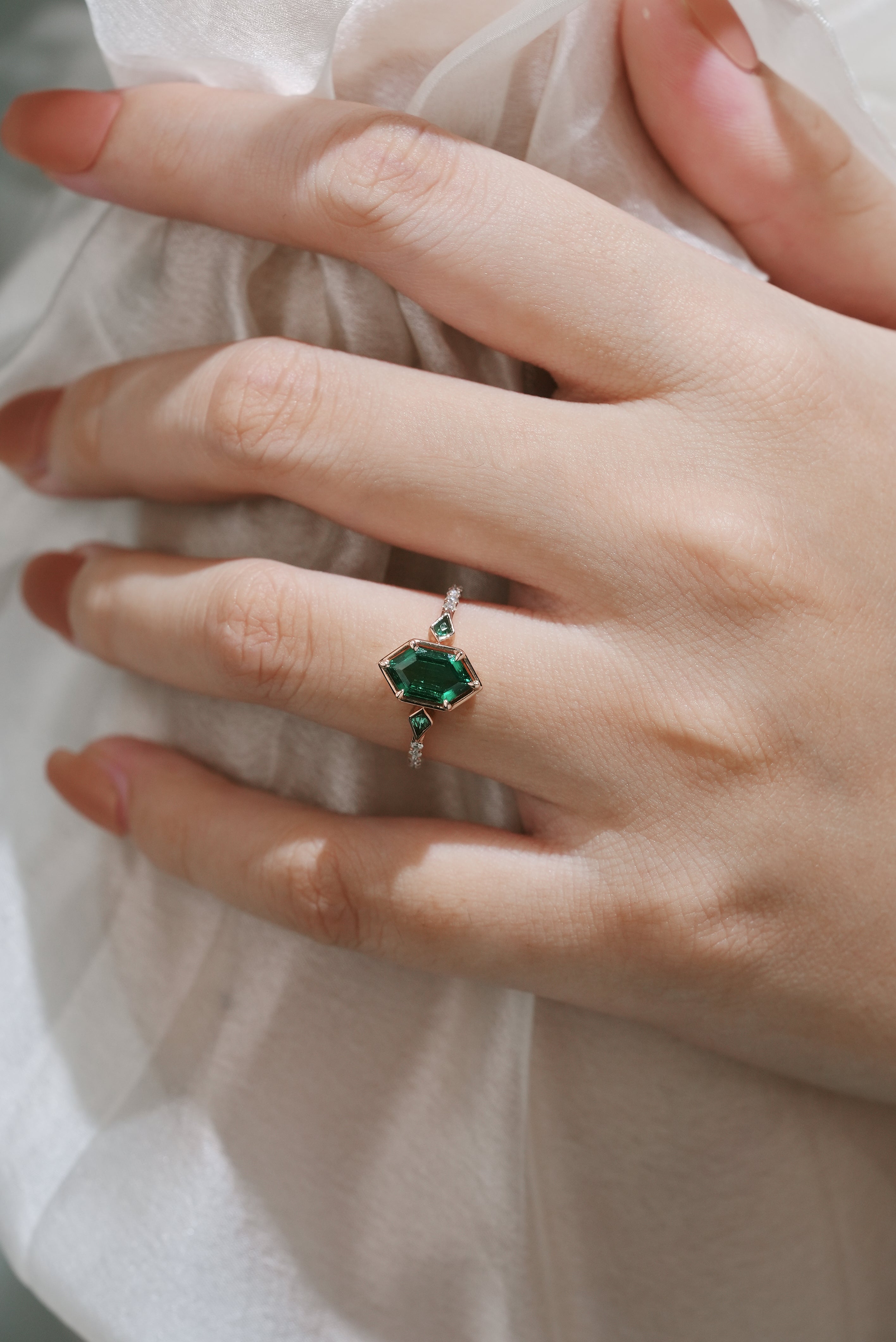 Emerald engagement ring with hexagon cut center stone, Lahela Jewelry