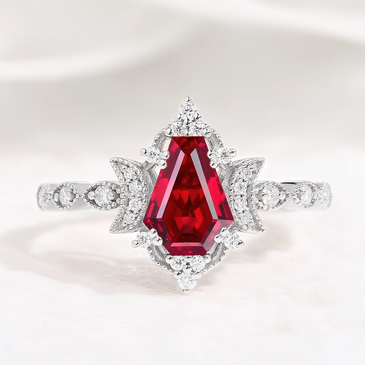 Coffin cut ruby anniversary ring with moon design