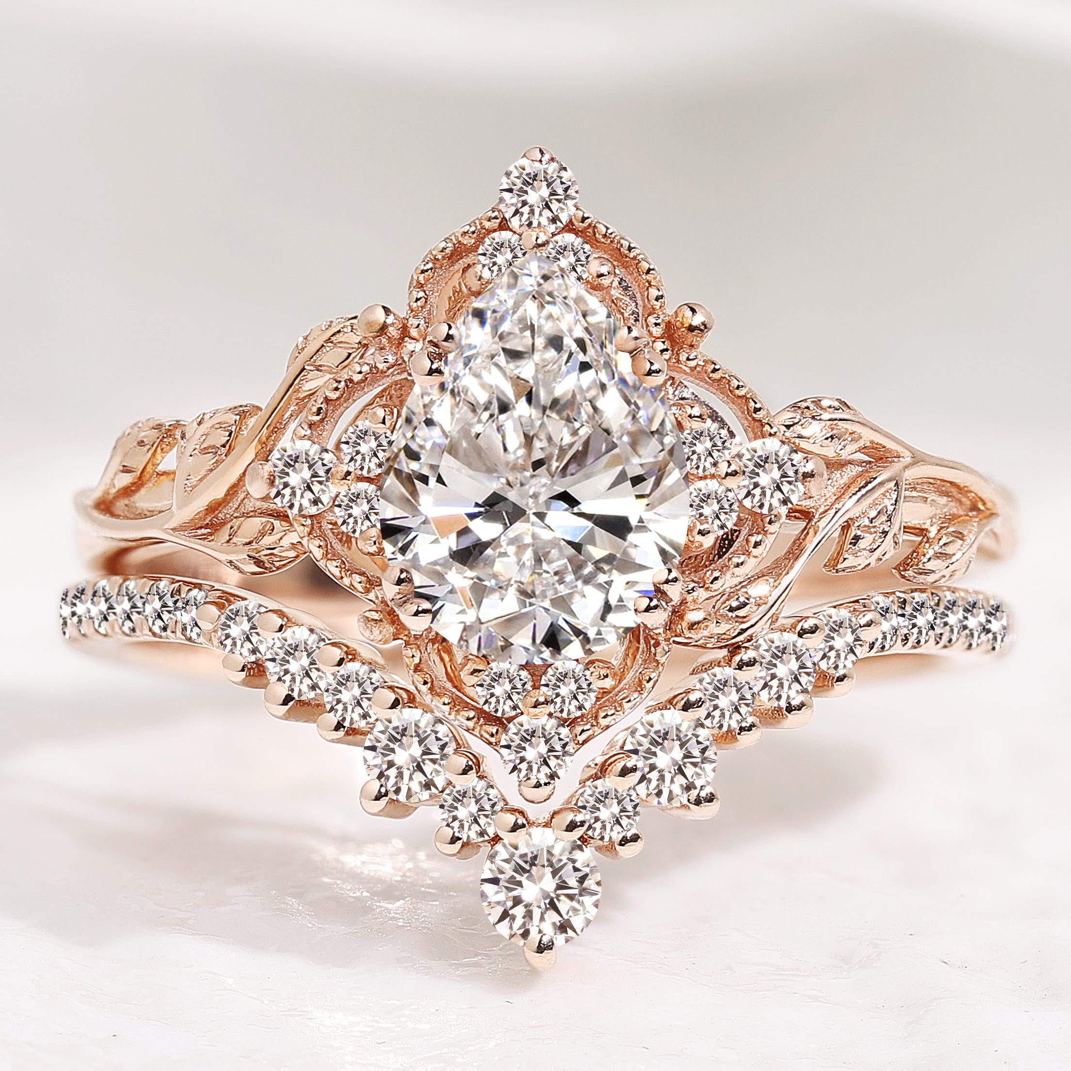 Pear cut lab-grown diamond leaf engagement ring set