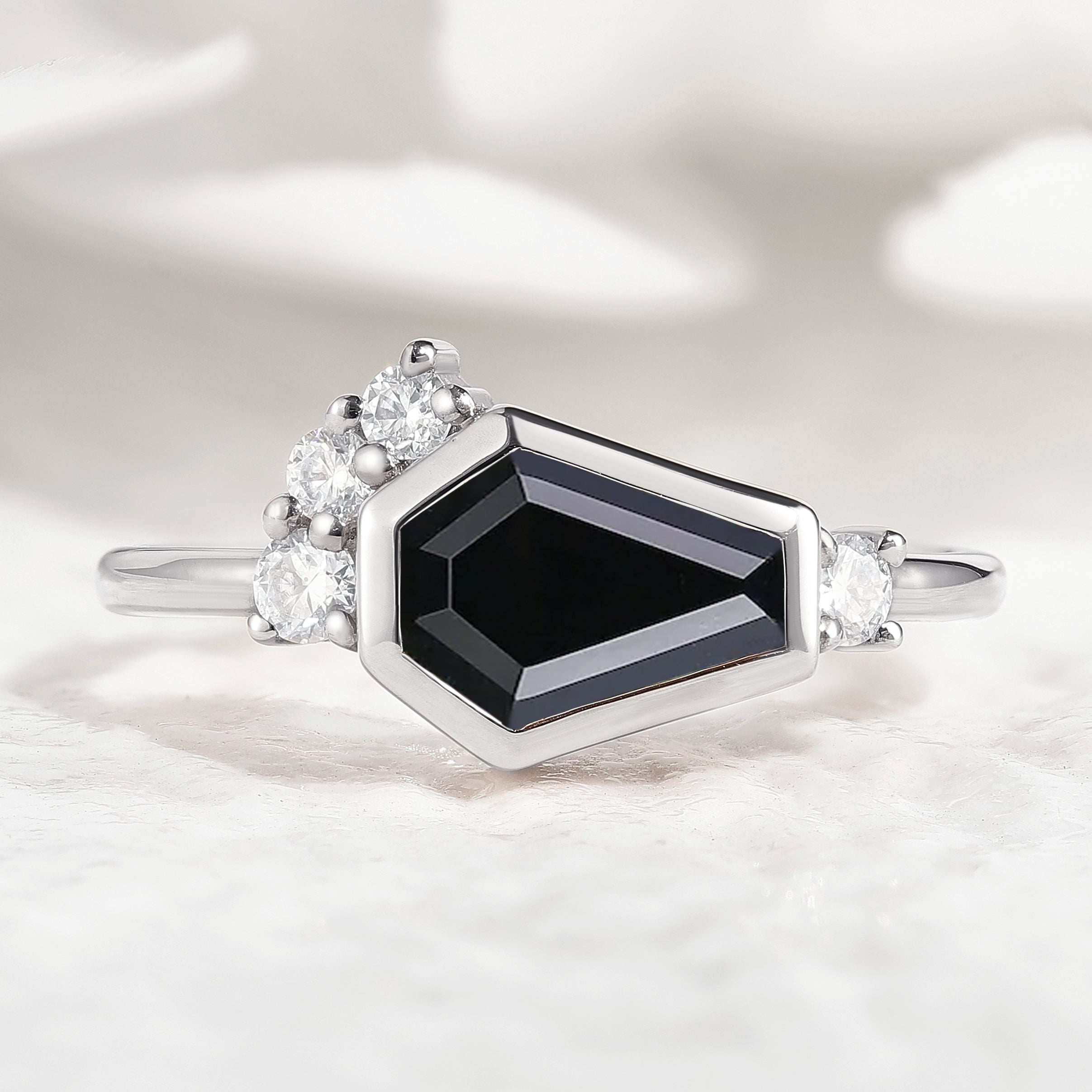 Modern black onyx coffin cut engagement ring with diamond accents