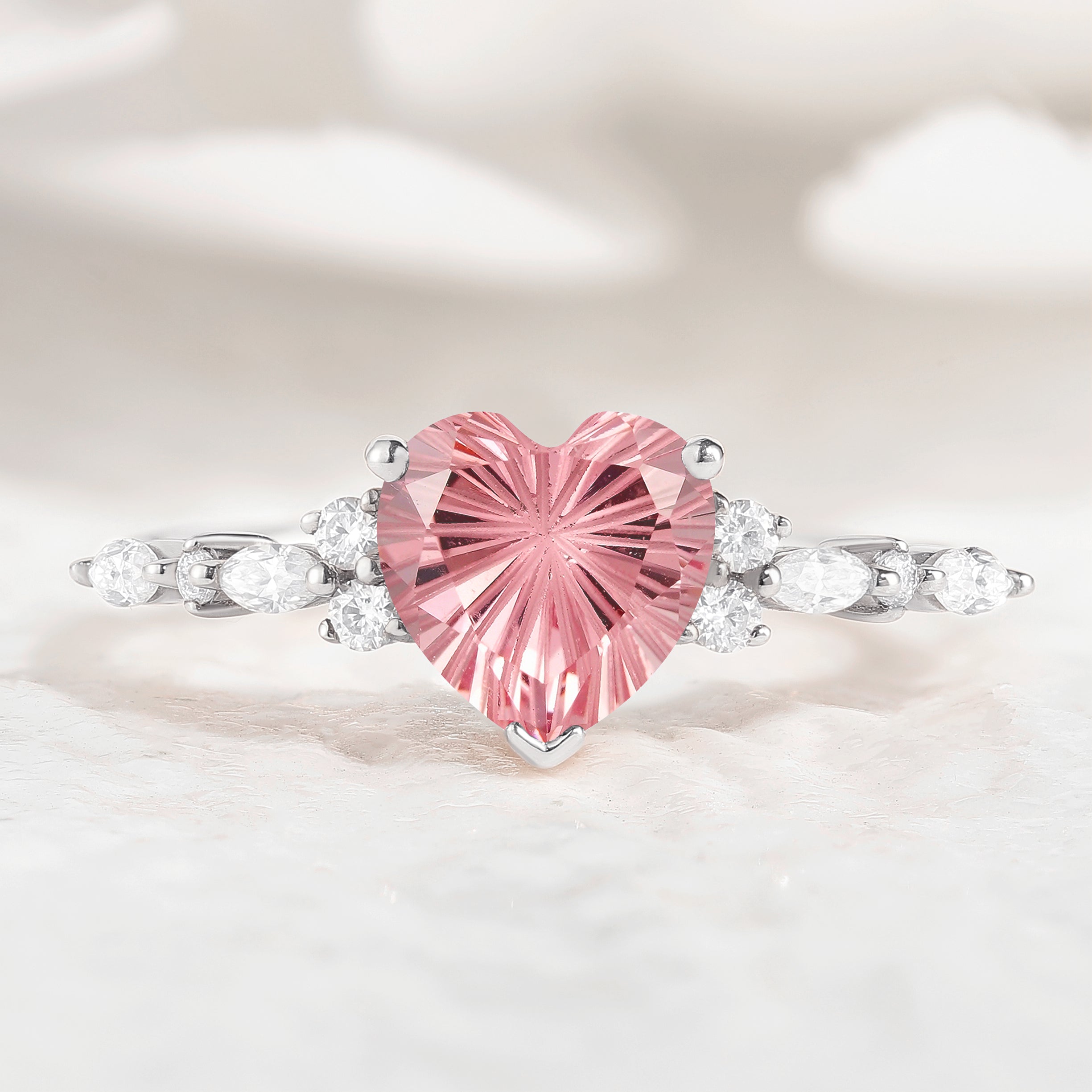 Heart-shaped Starbrite Padparadscha ring with moissanite accents
