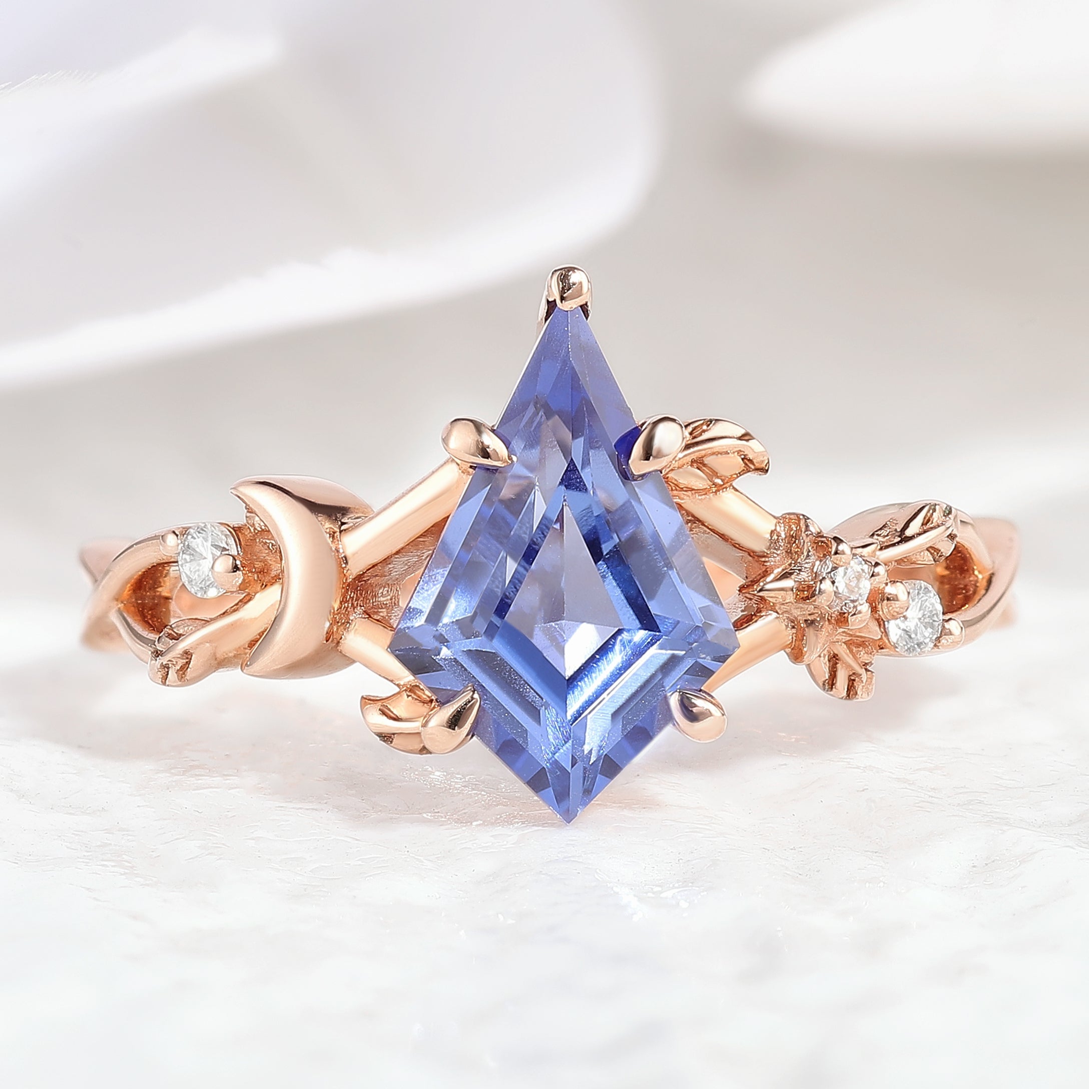 Unique Design Kite Shaped Lab Sapphire Engagement Ring with leaf detailing