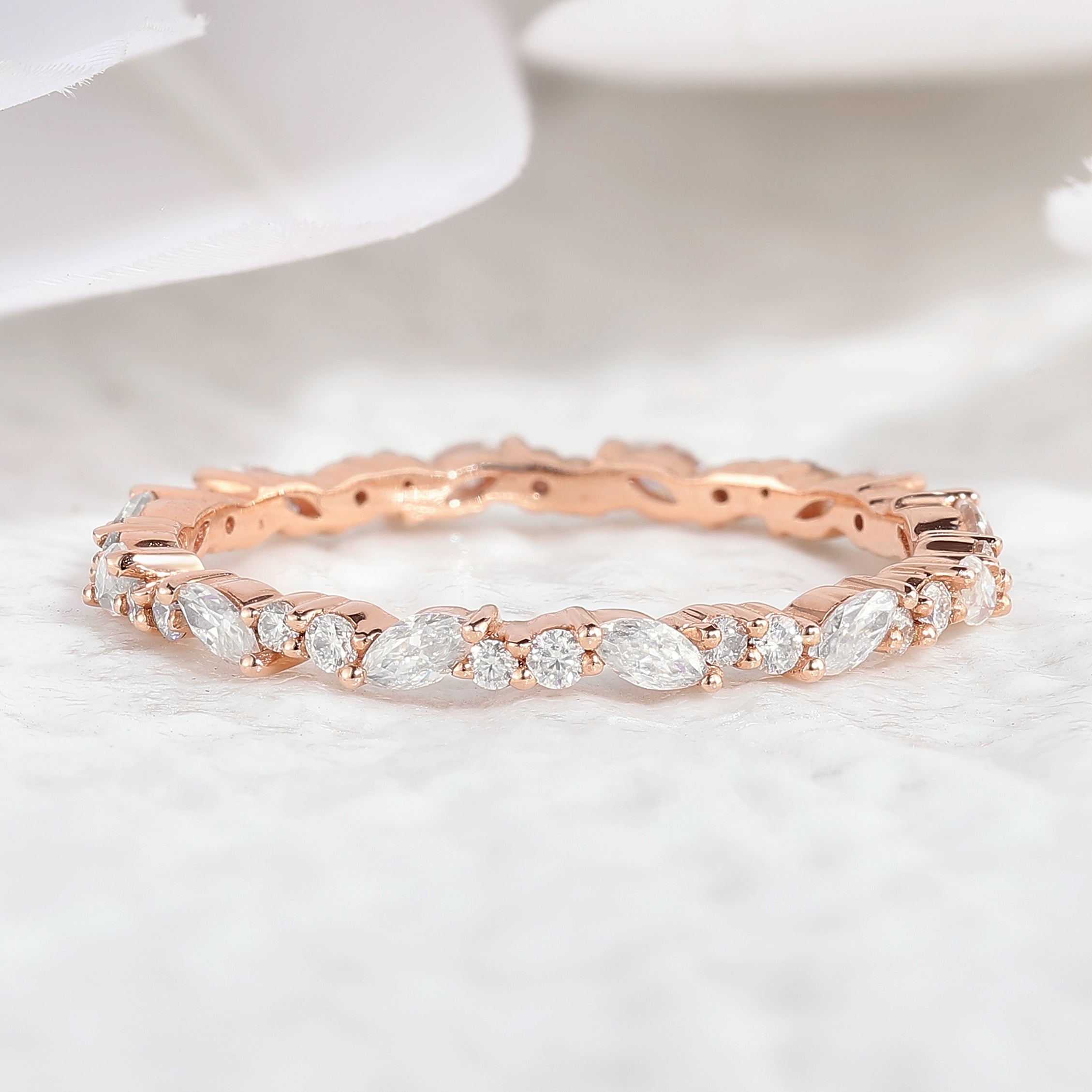 Rose gold marquise and round cut moissanite stacking band