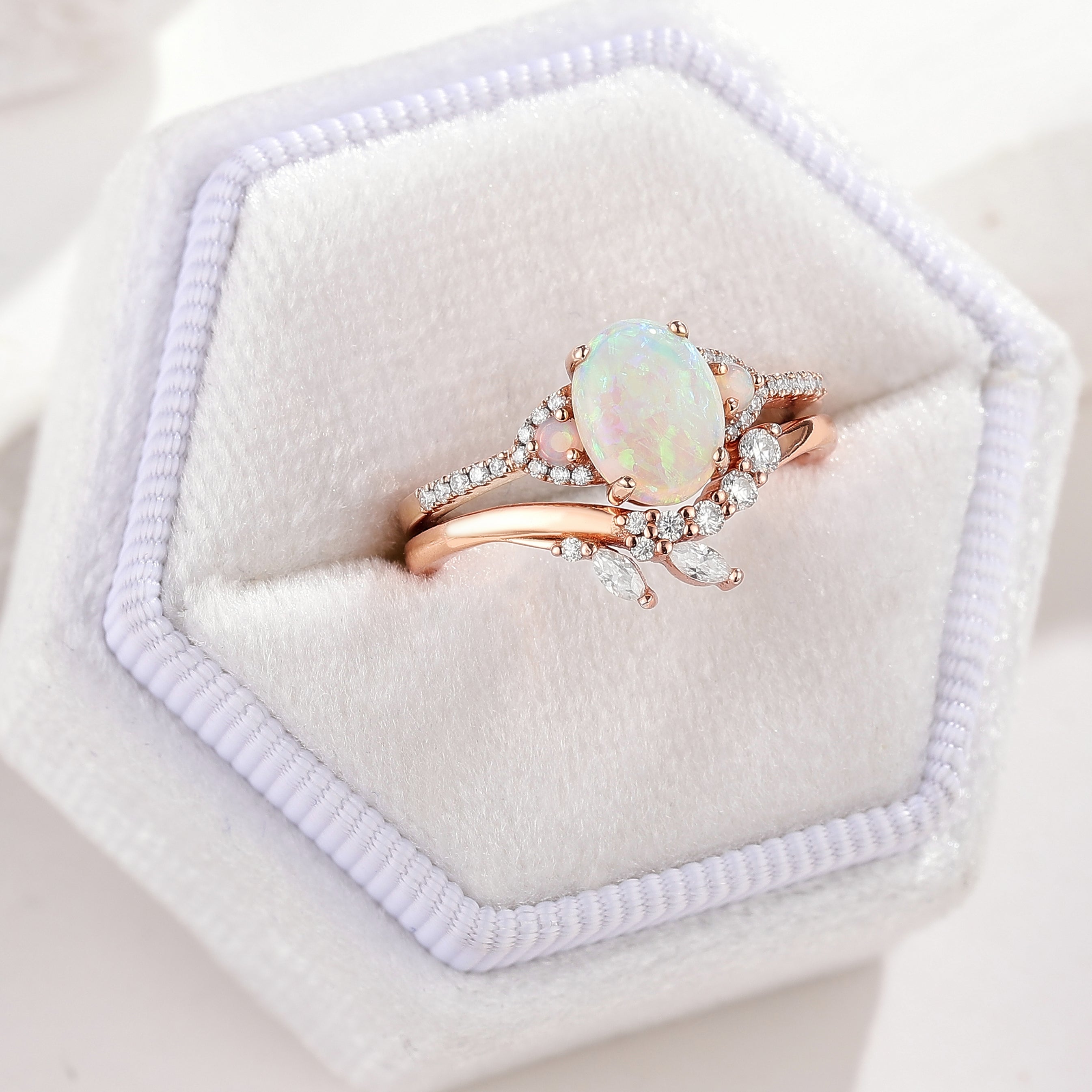 Rose gold opal engagement ring set with leaf design