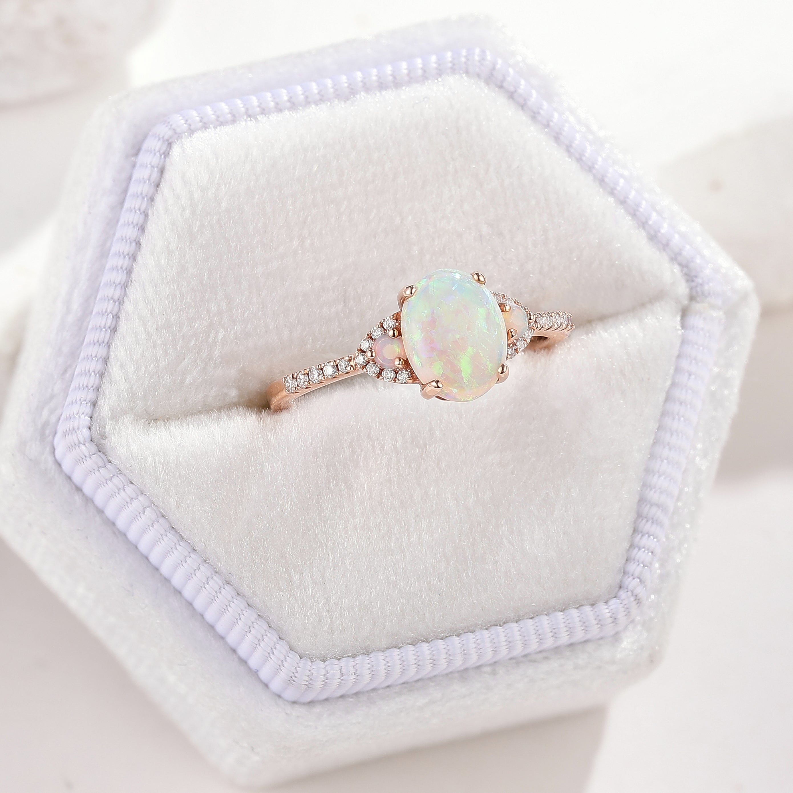 Oval opal engagement ring in rose gold with side stones, Lahela Jewelry