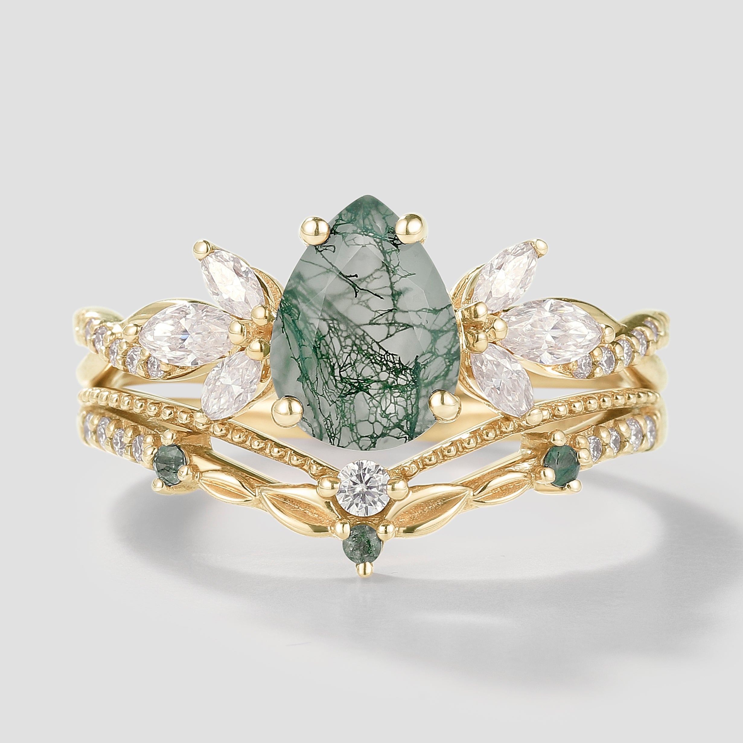 Nature-inspired pear cut moss agate engagement ring set