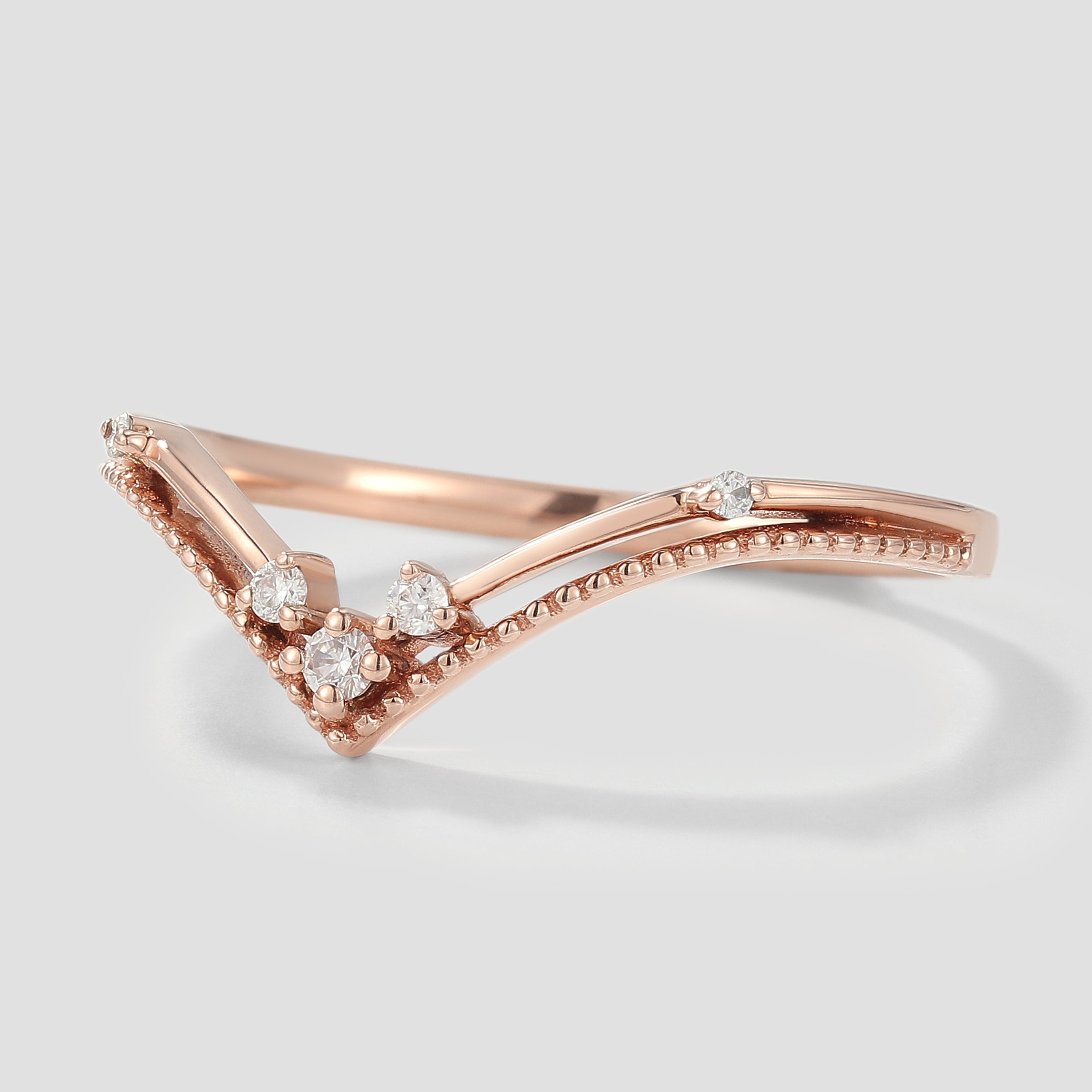 Rose gold moissanite wedding band, curved design