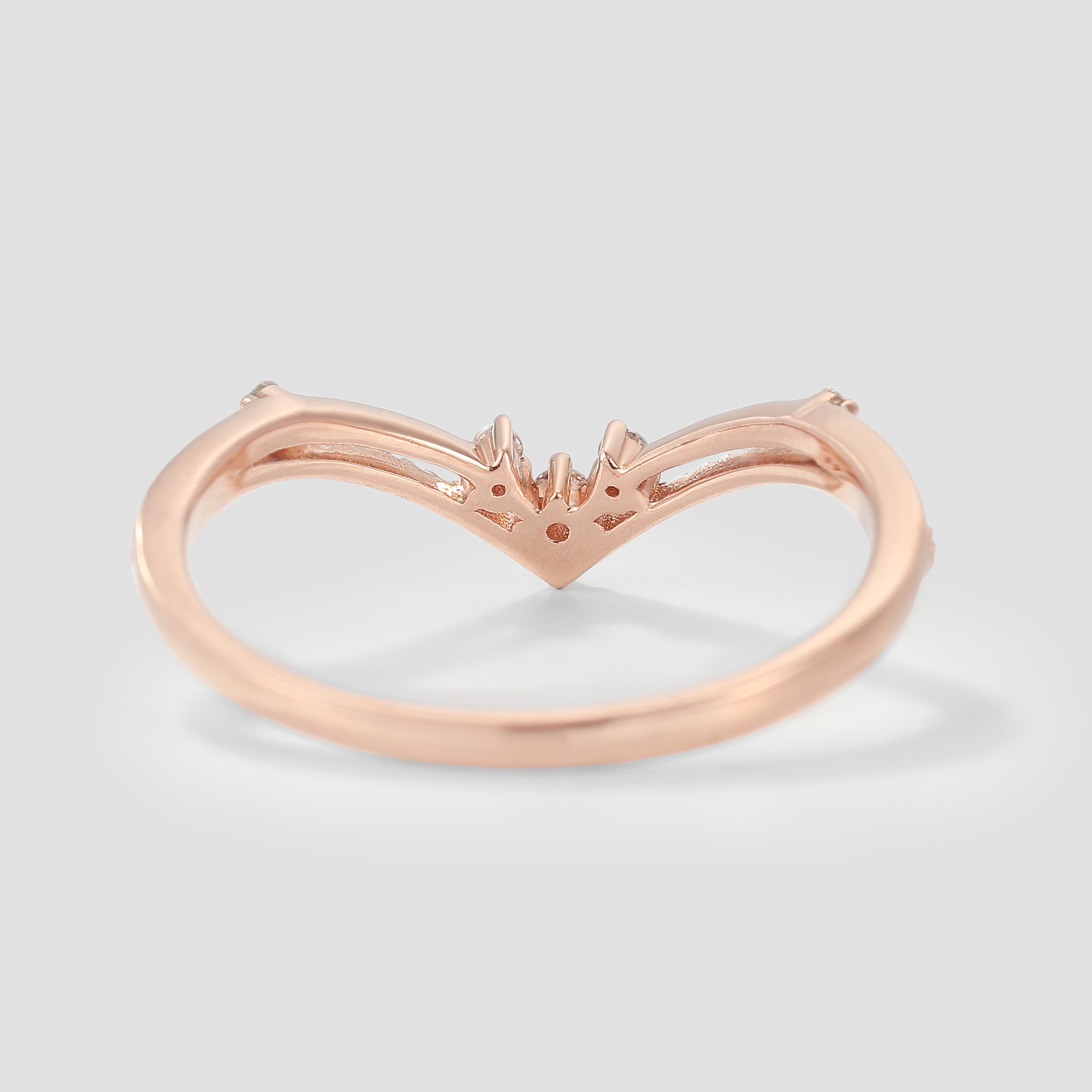 Rose gold curved moissanite wedding band, stackable design