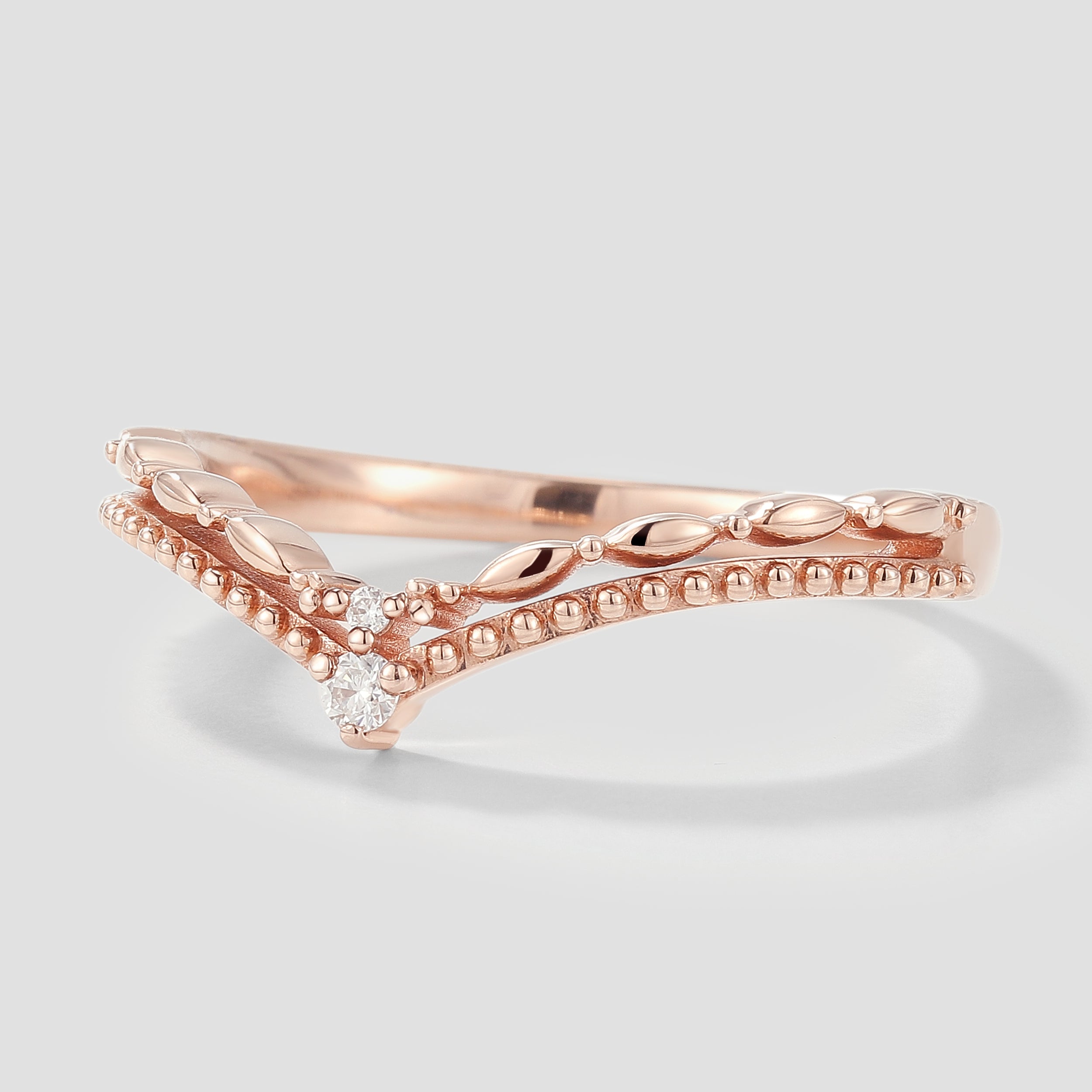 Rose gold Curved V Shaped Moissanite Wedding Band with bead and leaf detailing