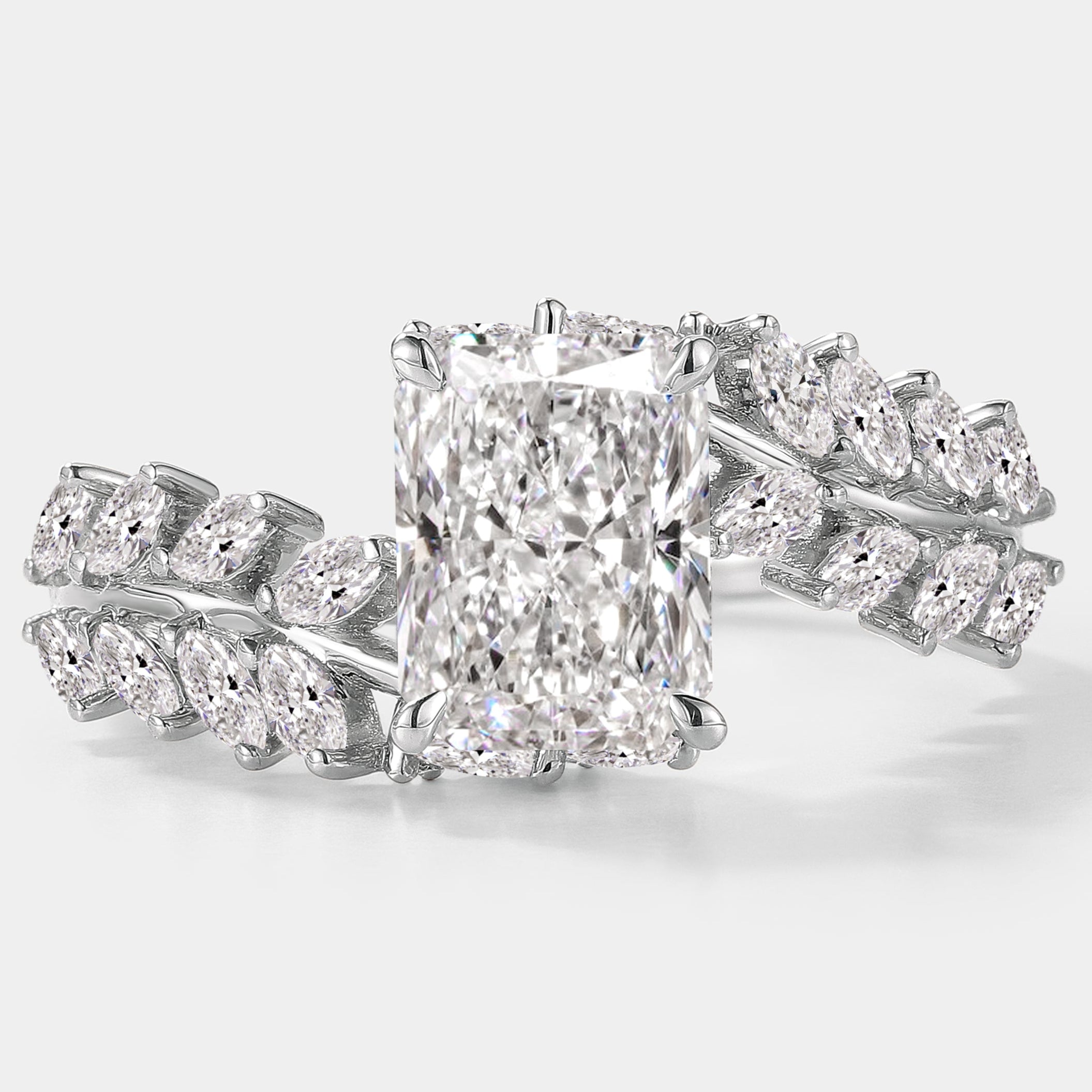 Emerald cut lab grown diamond ring with leaf band detail