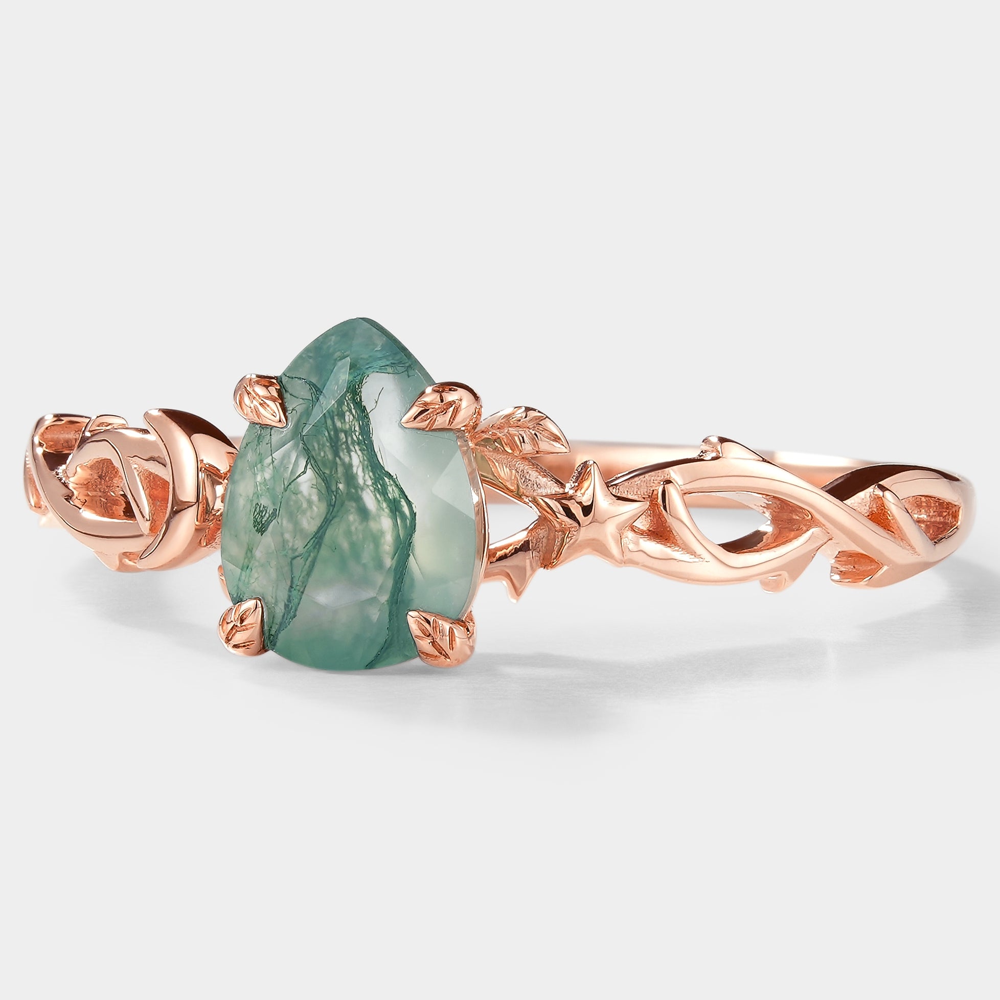 Nature-inspired Pear Cut Moss Agate Engagement Ring with Moon and Star Detail