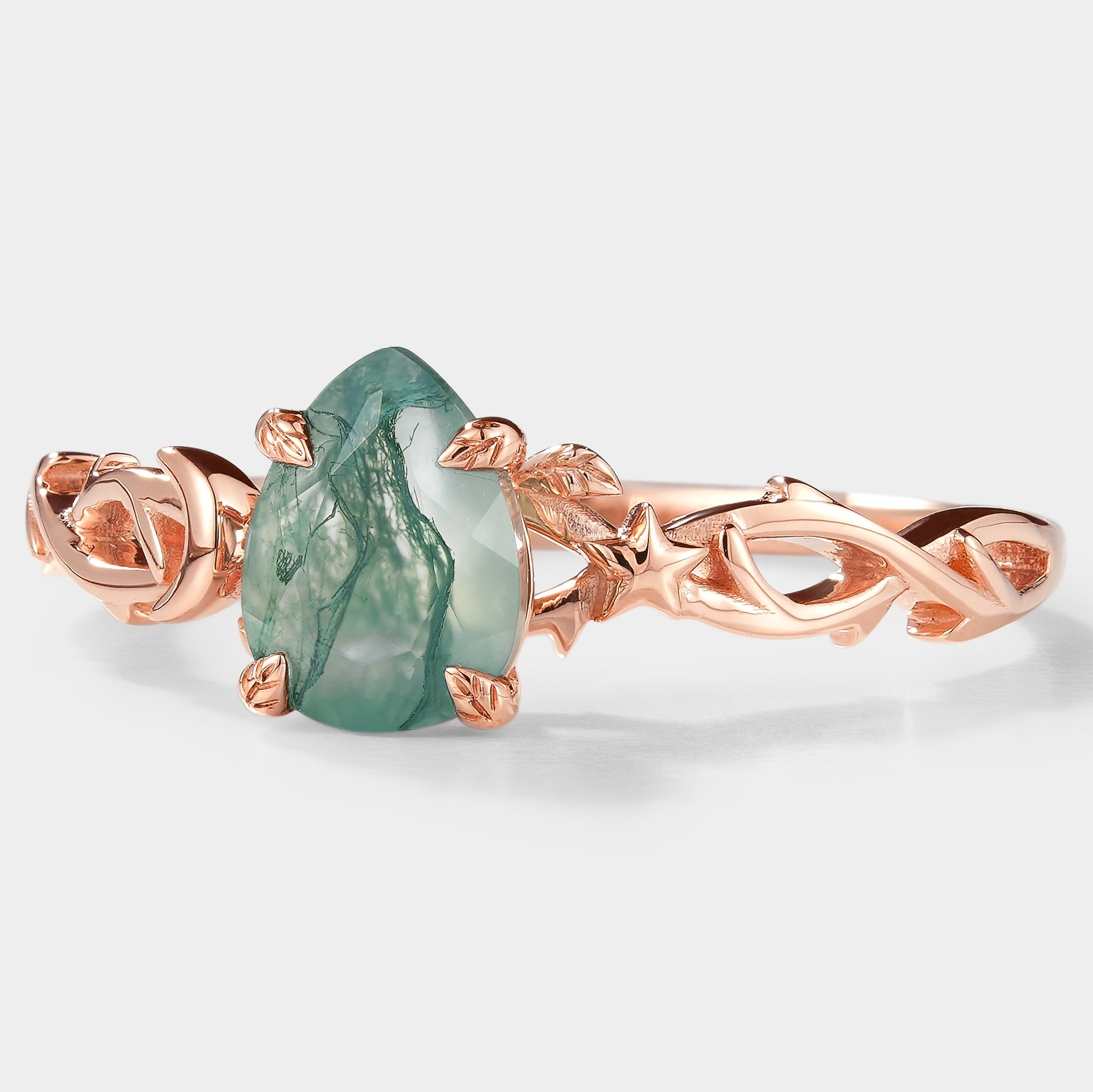 Nature-inspired Pear Cut Moss Agate Engagement Ring with Moon and Star Detail
