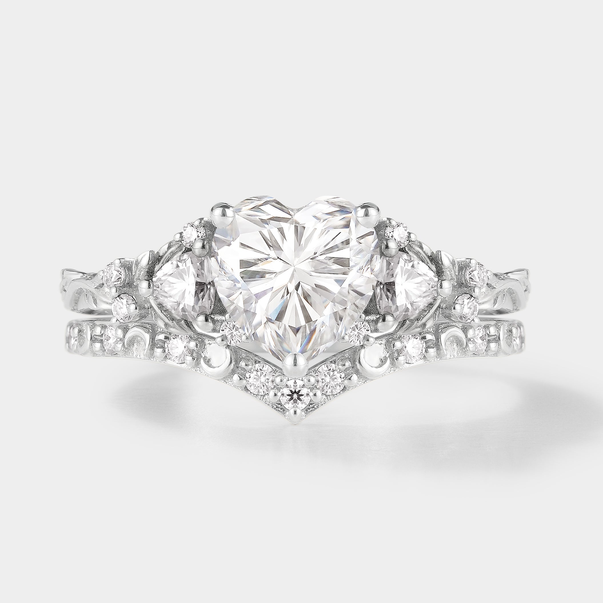 Heart-cut moissanite engagement ring set with leaf and moon design