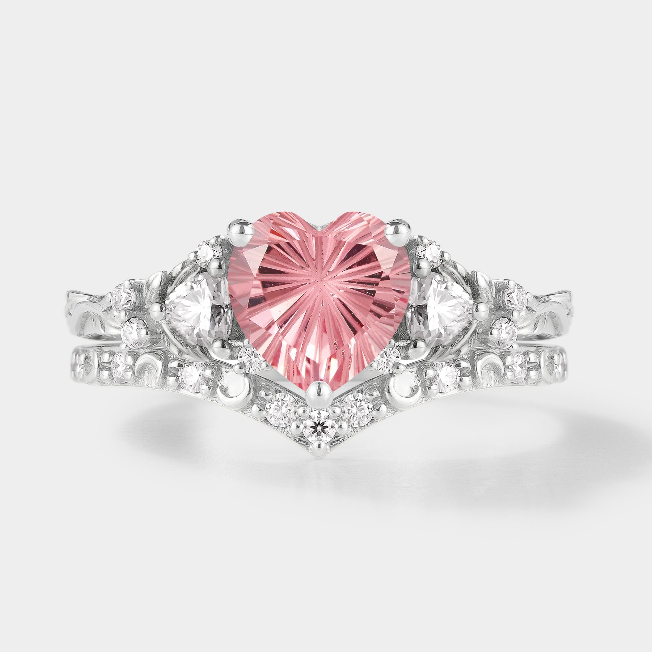 Heart-cut Padparadscha ring set with moissanite