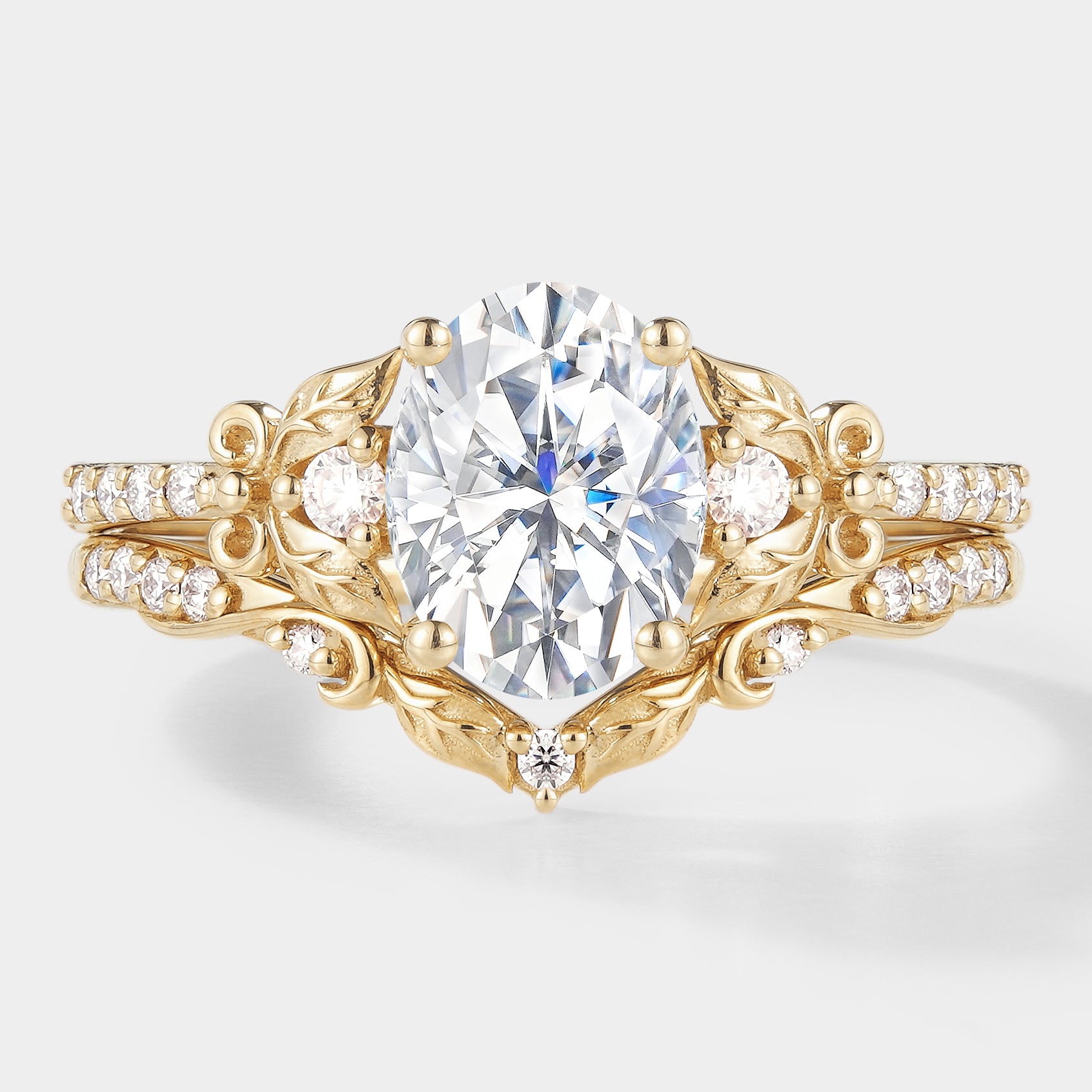 Oval moissanite leaf engagement ring set, gold
