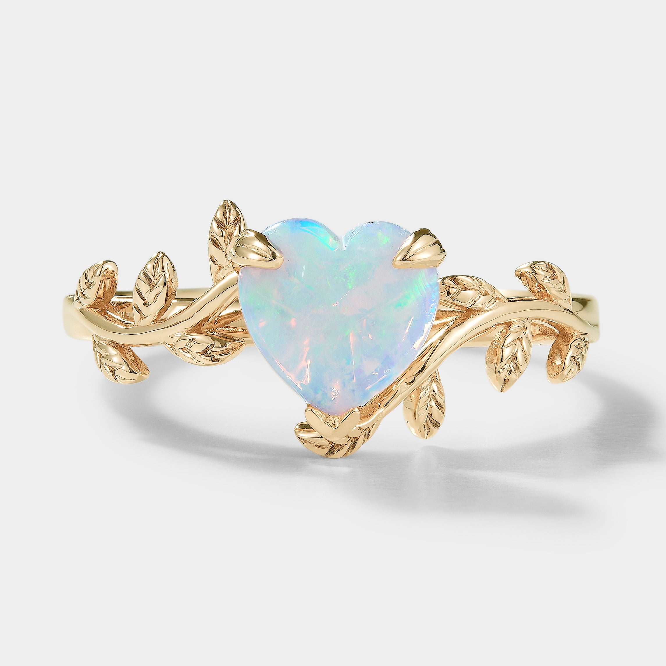 Gold heart-cut opal ring with leaf design, Lahela Jewelry