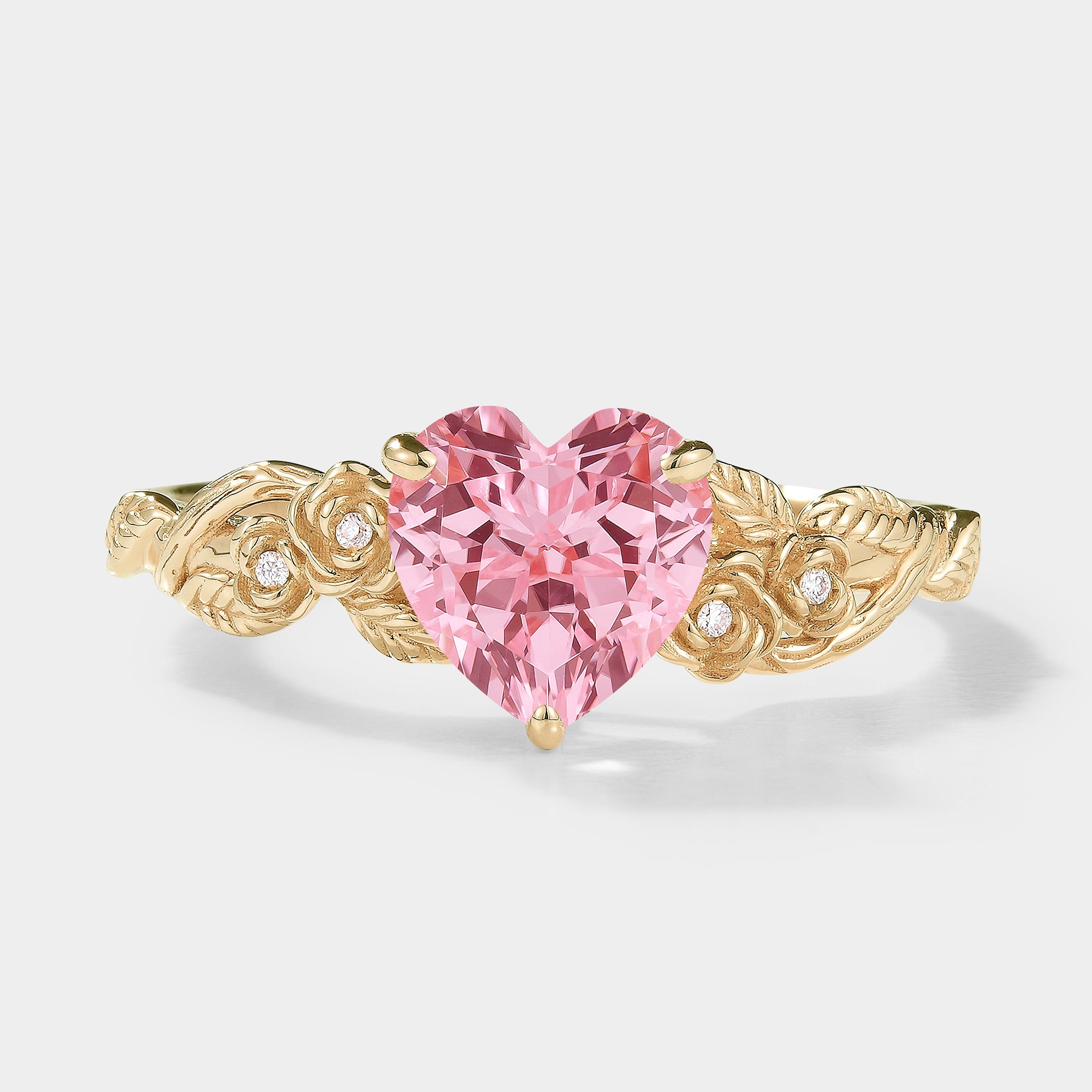 Nature-inspired heart cut Padparadscha sapphire engagement ring