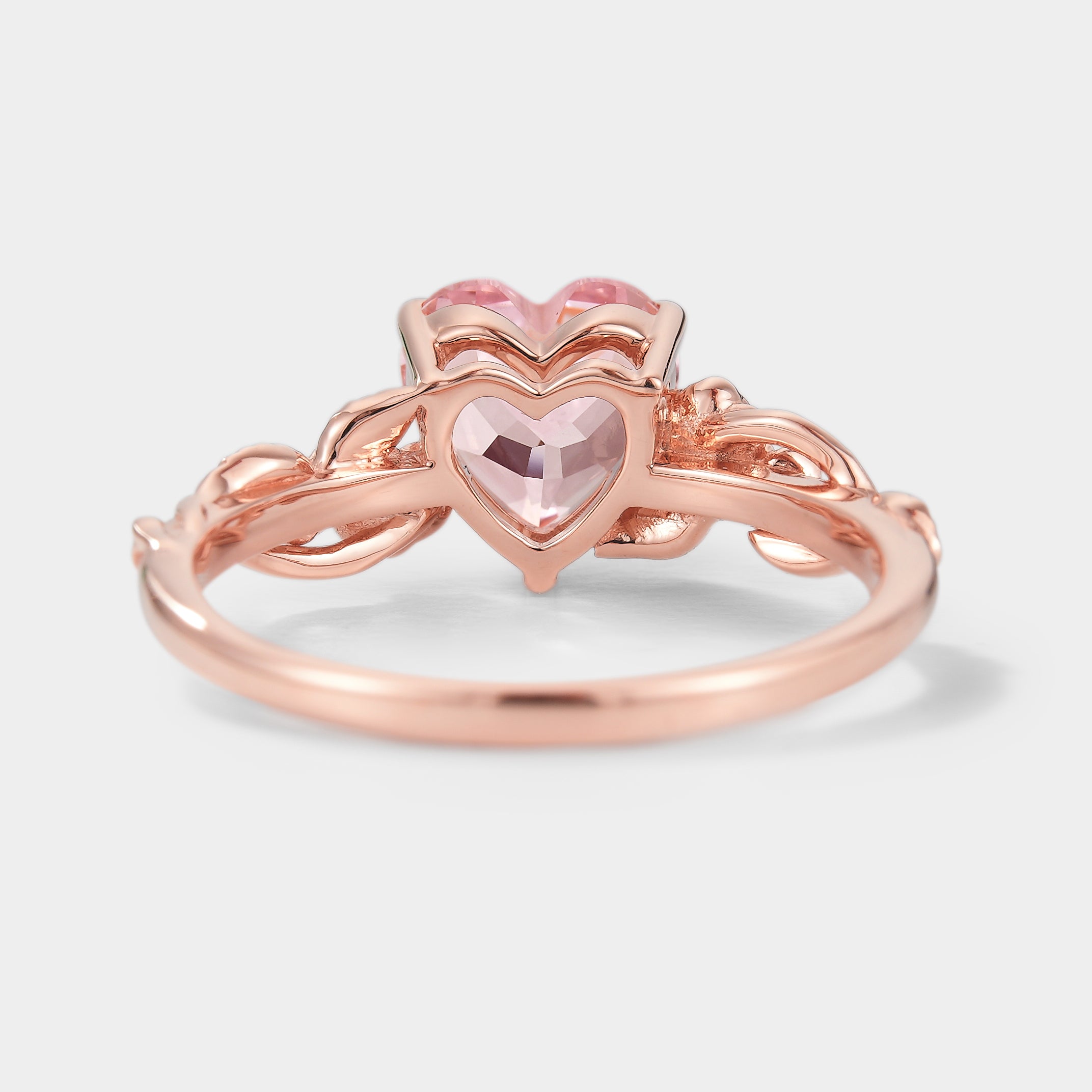 Rose gold heart cut Padparadscha sapphire ring with leaf design
