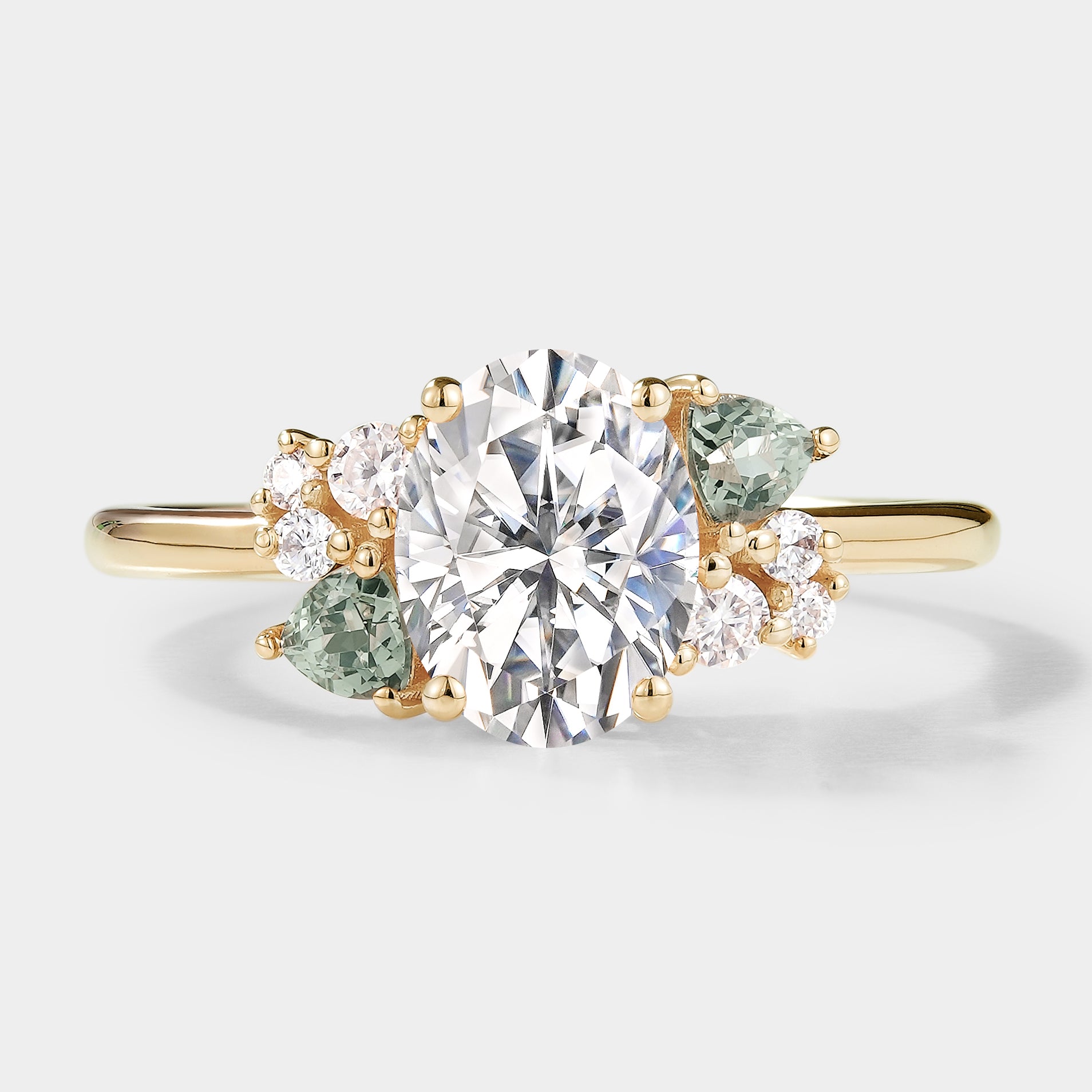 Oval cut moissanite engagement ring with spinel and moissanite cluster