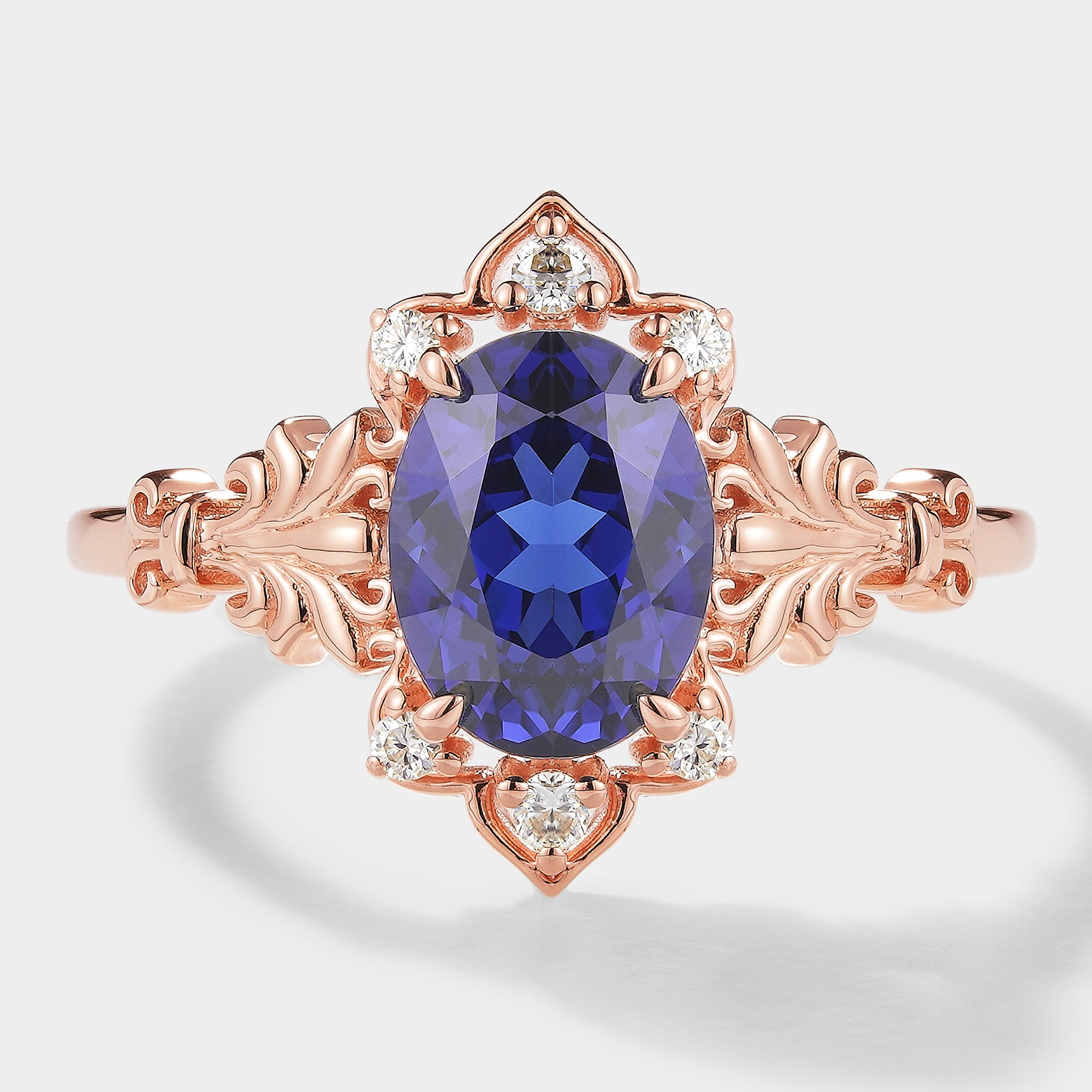 Royal Blue Sapphire and Moissanite Engagement Ring with Rose Gold