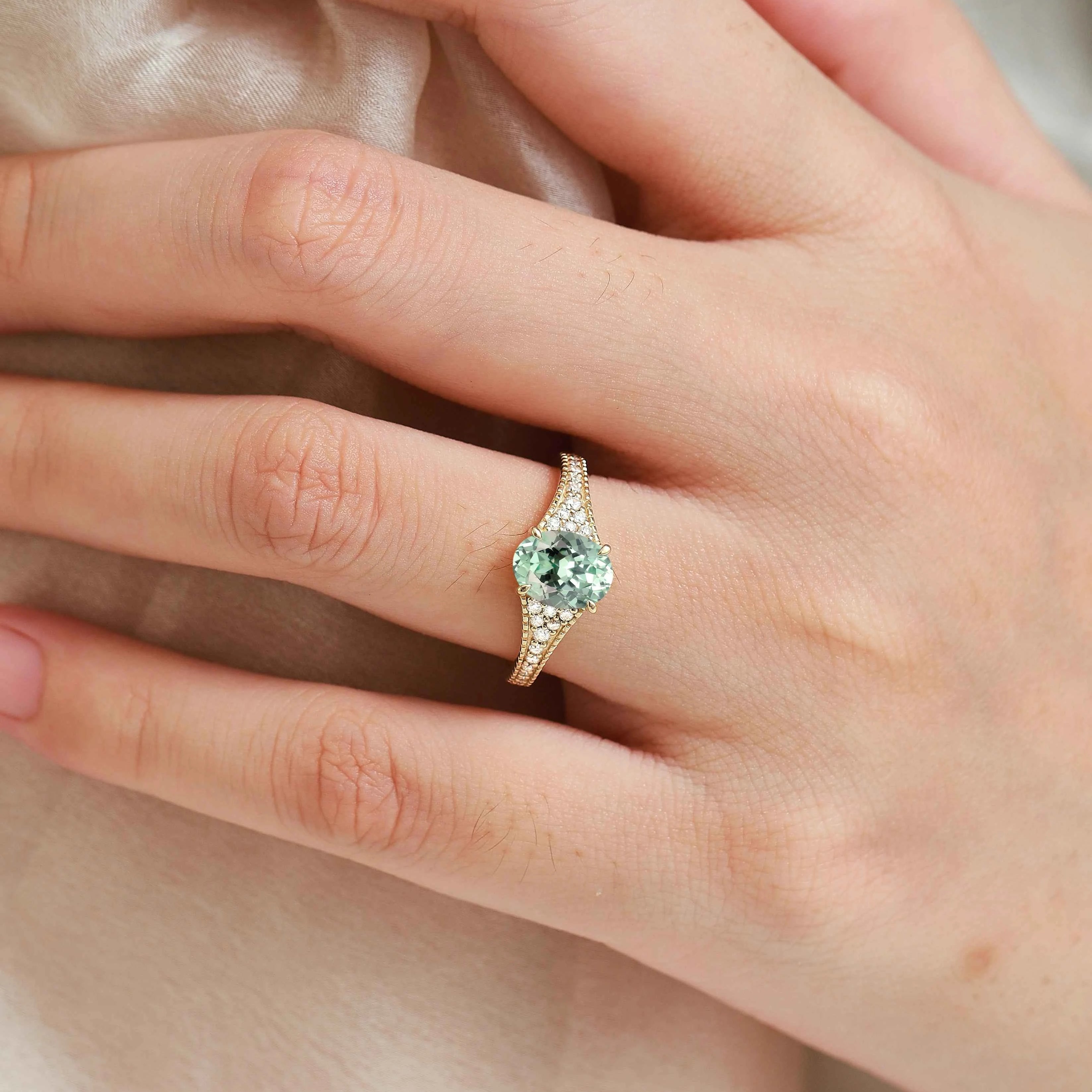 Vintage Bezel Oval Cut Sapphire Pavé Engagement Ring