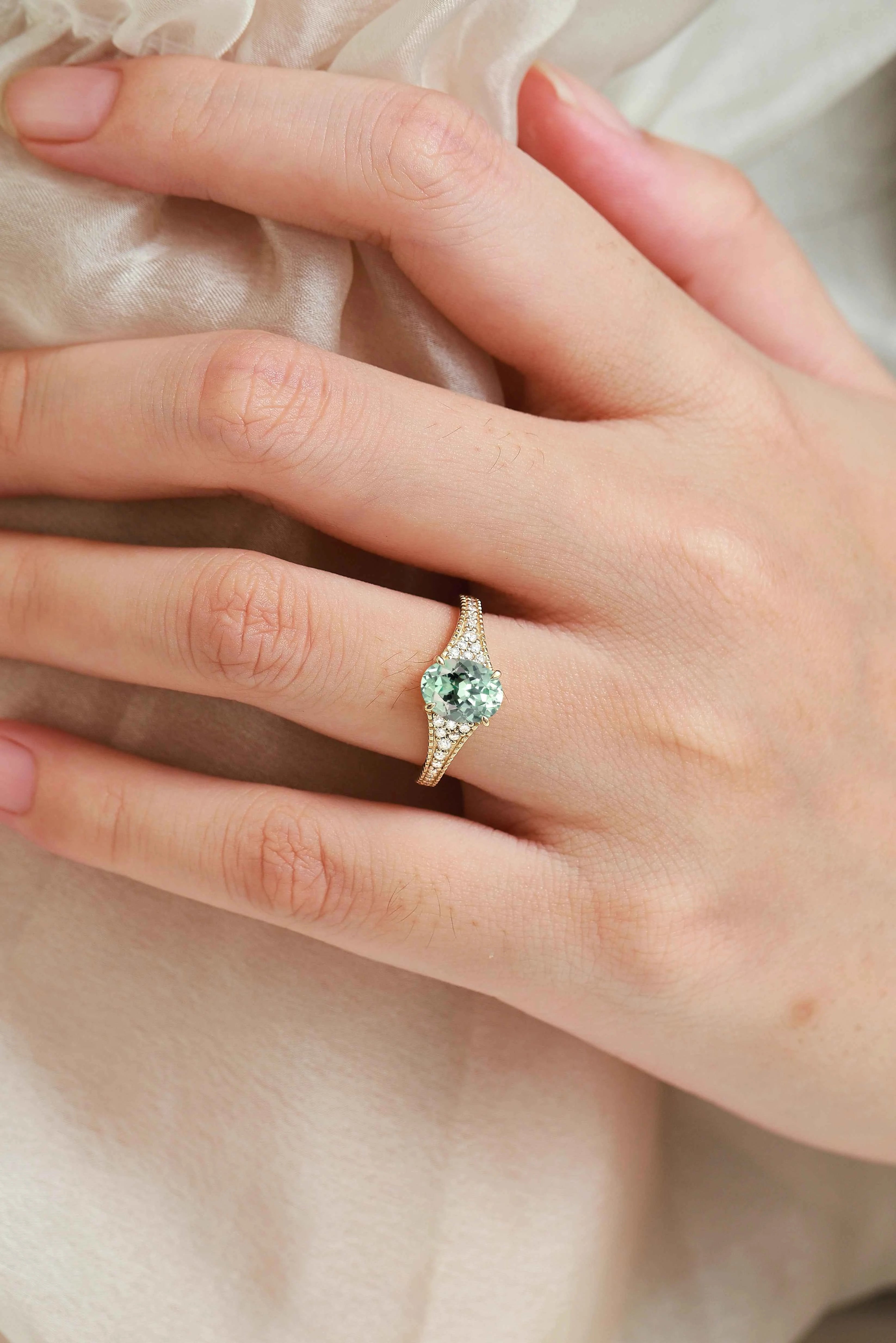 Vintage Bezel Oval Cut Sapphire Pavé Engagement Ring