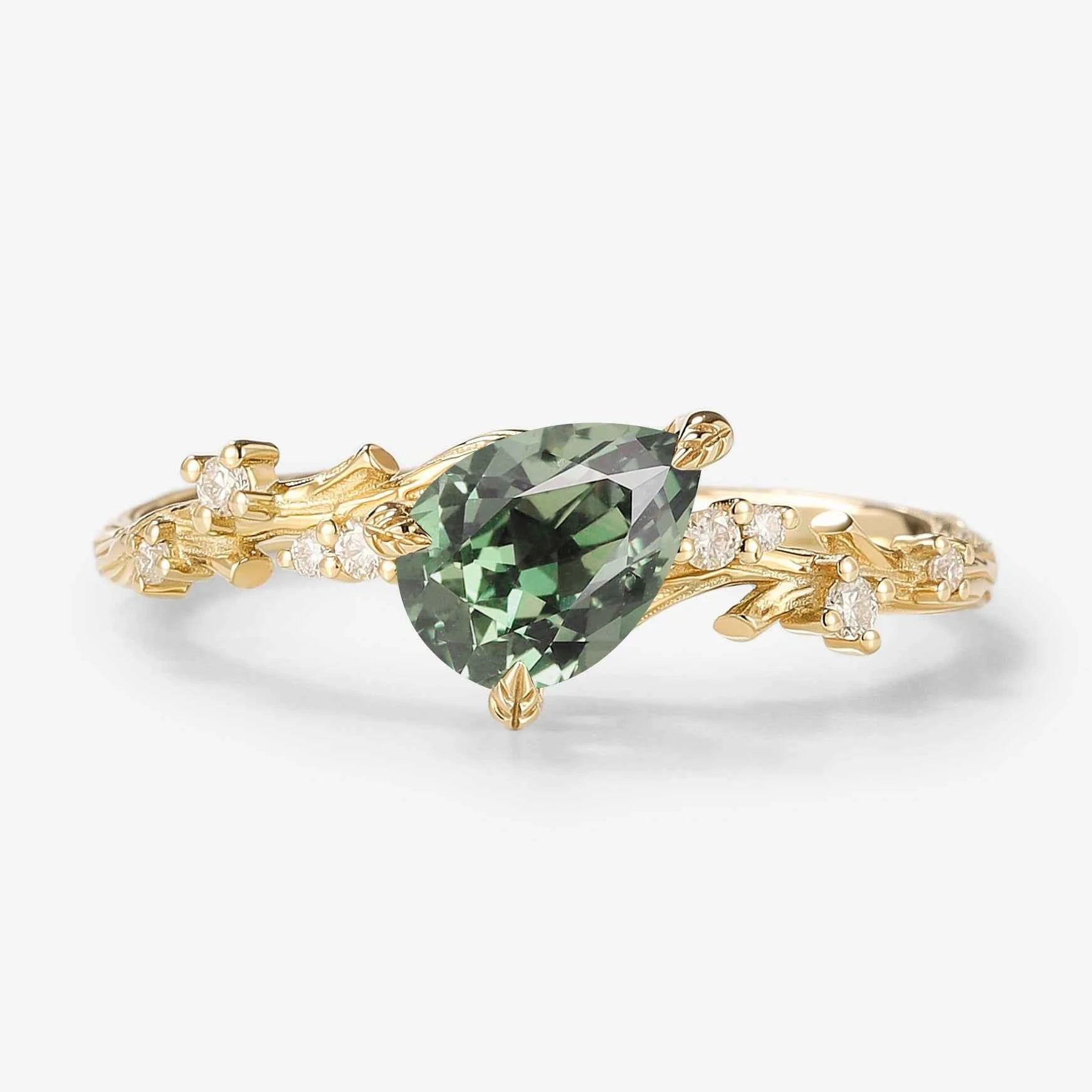 Branch & Leaf Prong Unique Tilted Pear-Cut Teal Sapphire Engagement Ring